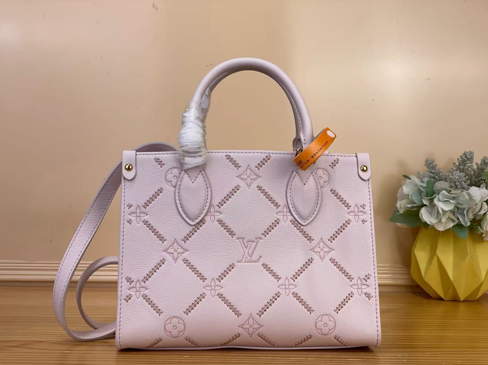 Louis Vuitton LV new pink embroidered OnTheGo small handbag