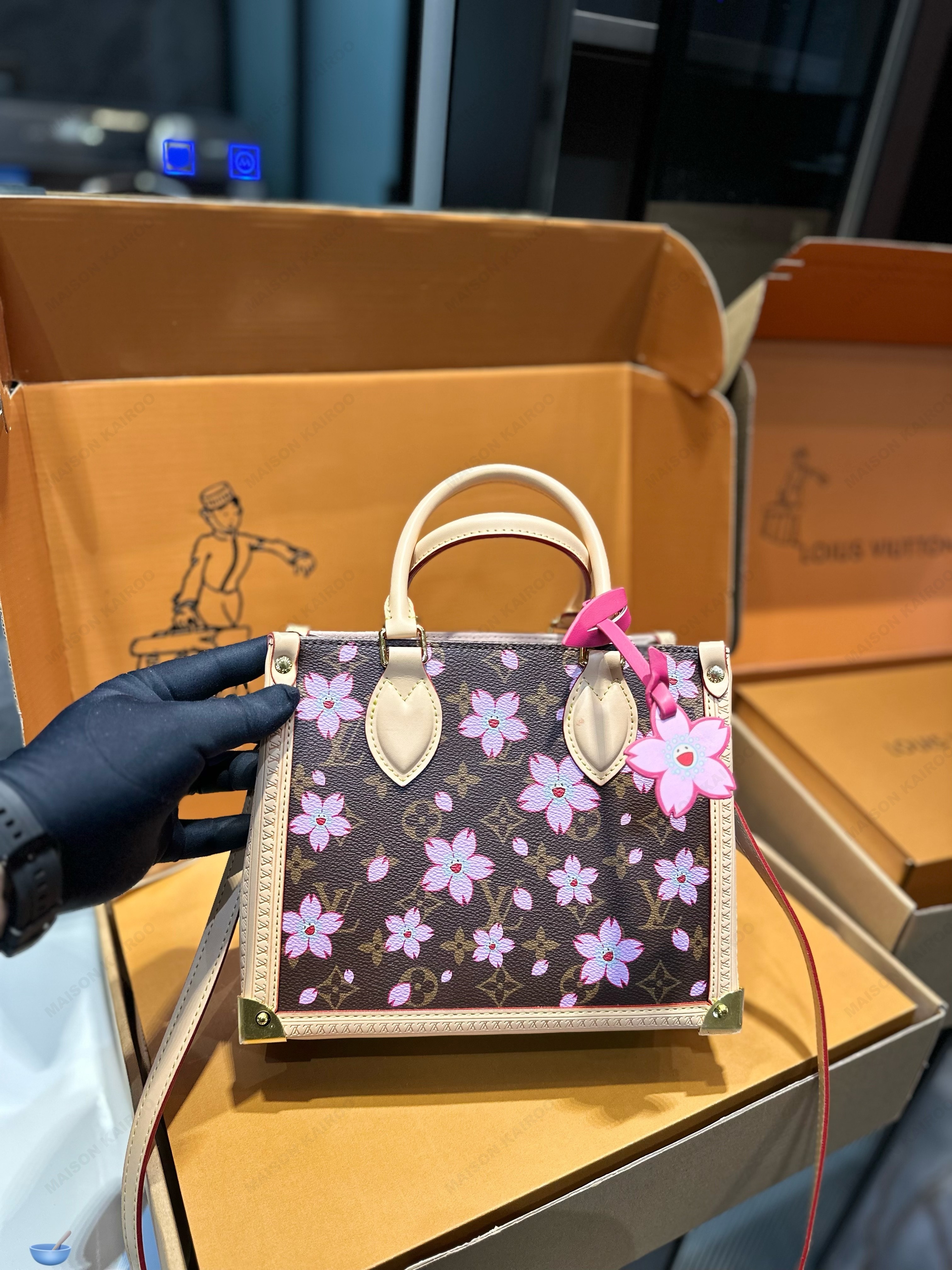 Louis Vuitton LV× TM OnTheGo Studded Trunk Corners PM/MM Monogram Cherry Blossom Top Handle Tote Bag - KAIROO