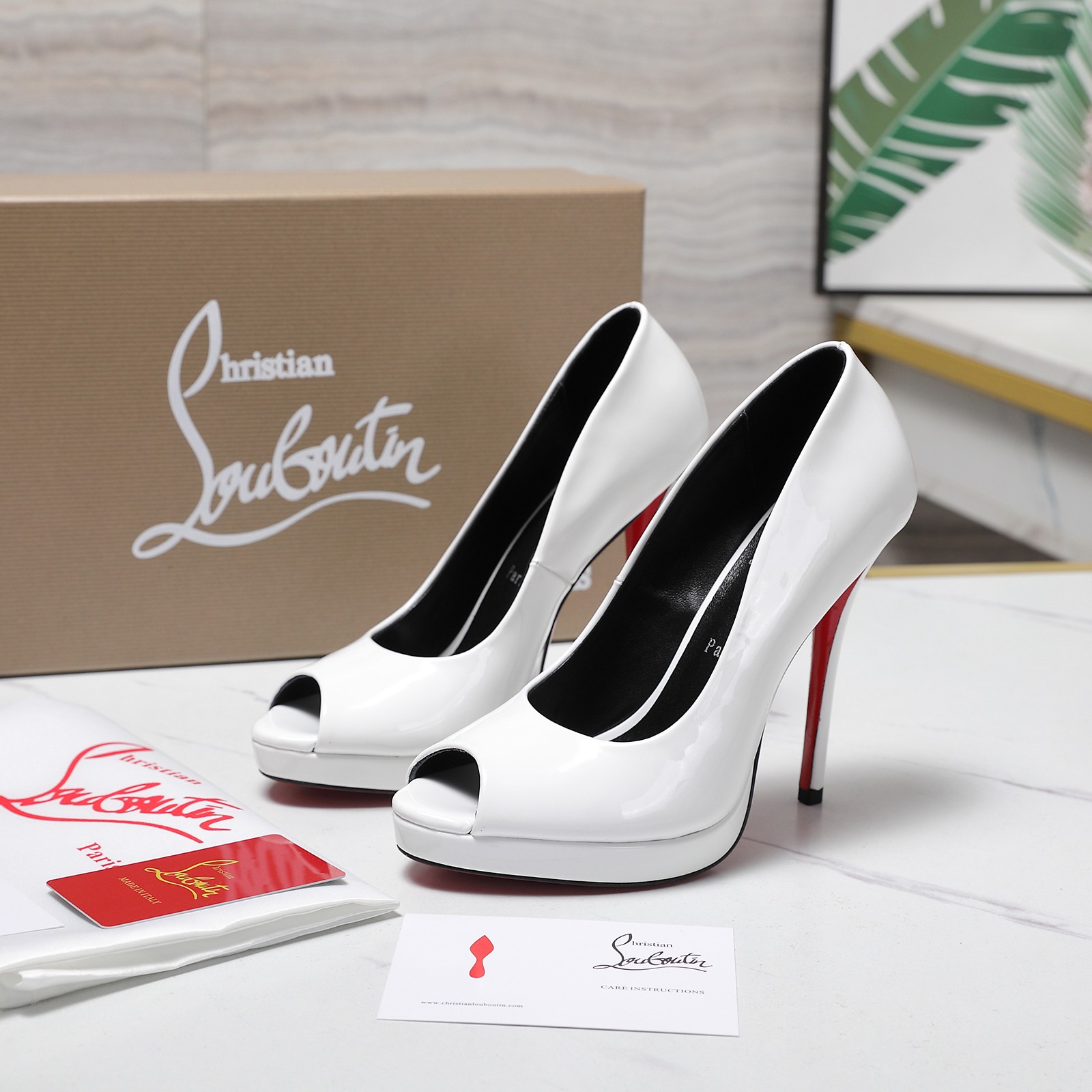 Christian Louboutin Shiny Calfskin Platform Pumps in White