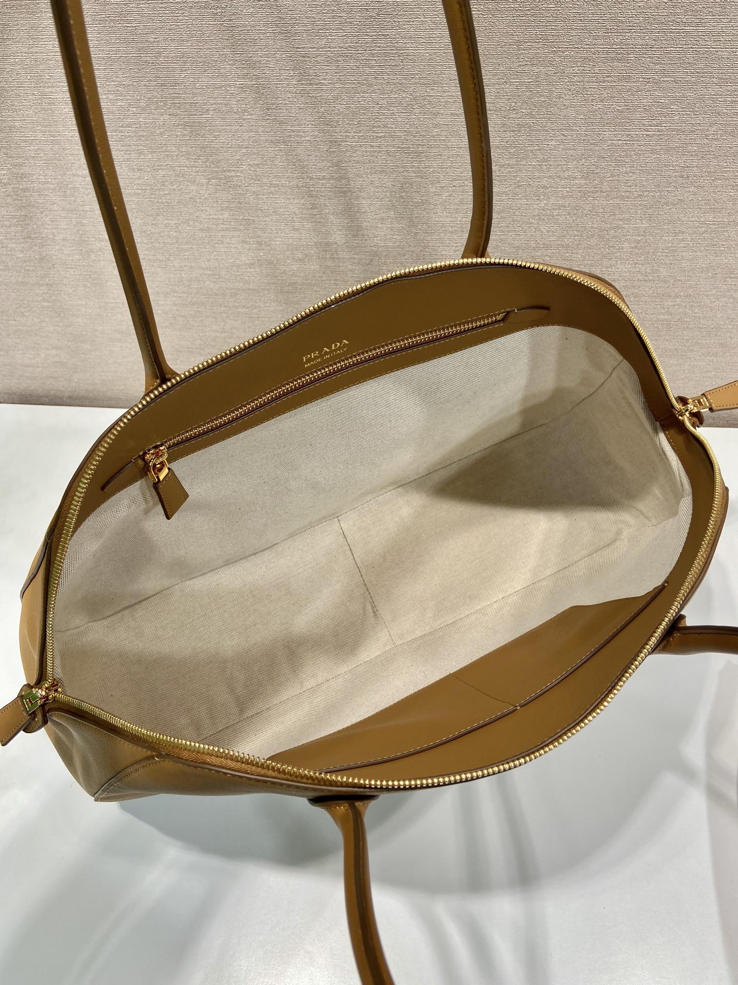 Prada LARGER TOTE BAG 48 WITH ZIPPER CLOSURE IN CIDER BROWN SMOOTH CALFSKIN