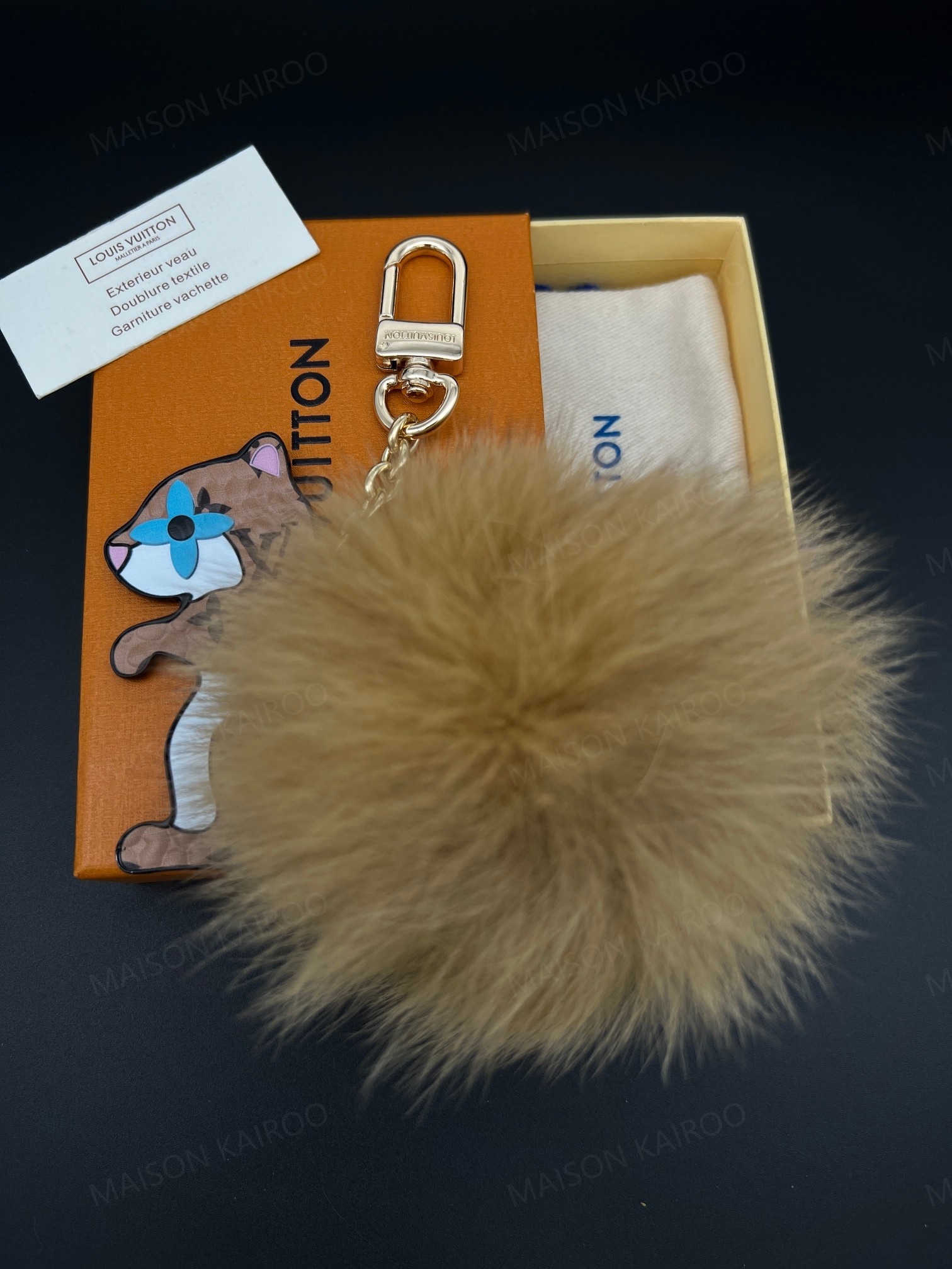 Louis Vuitton LV Monogram Squirrel Fur Pom Pom Bag Charm Keychain - KAIROO