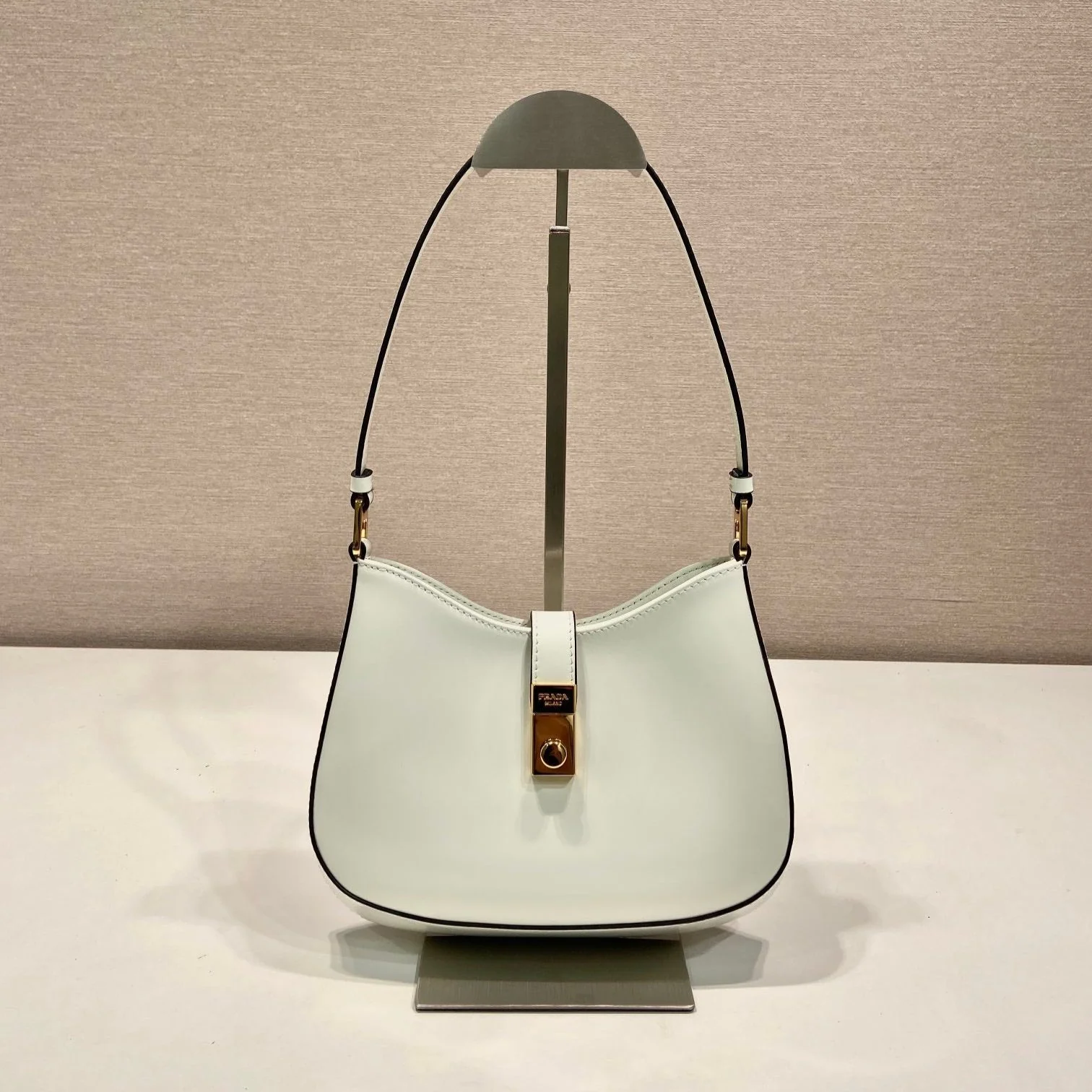 Prada CLEO SHOULDER BAG 22 IN WHITE BRUSHED LAMBSKIN WITH CLASP CLOSURE
