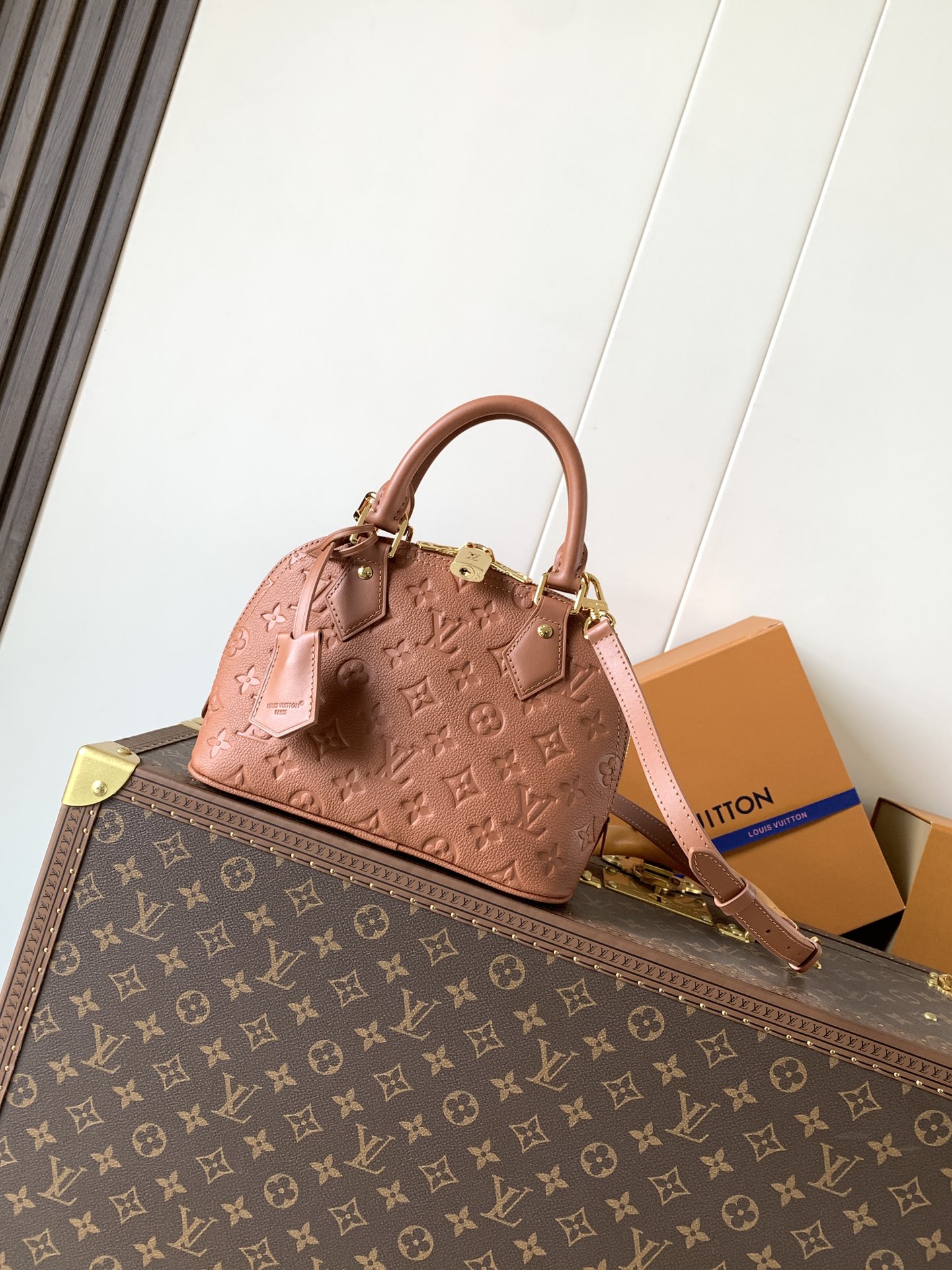 M28661 LV AlmaBB in Tan Monogram Empreinte leather