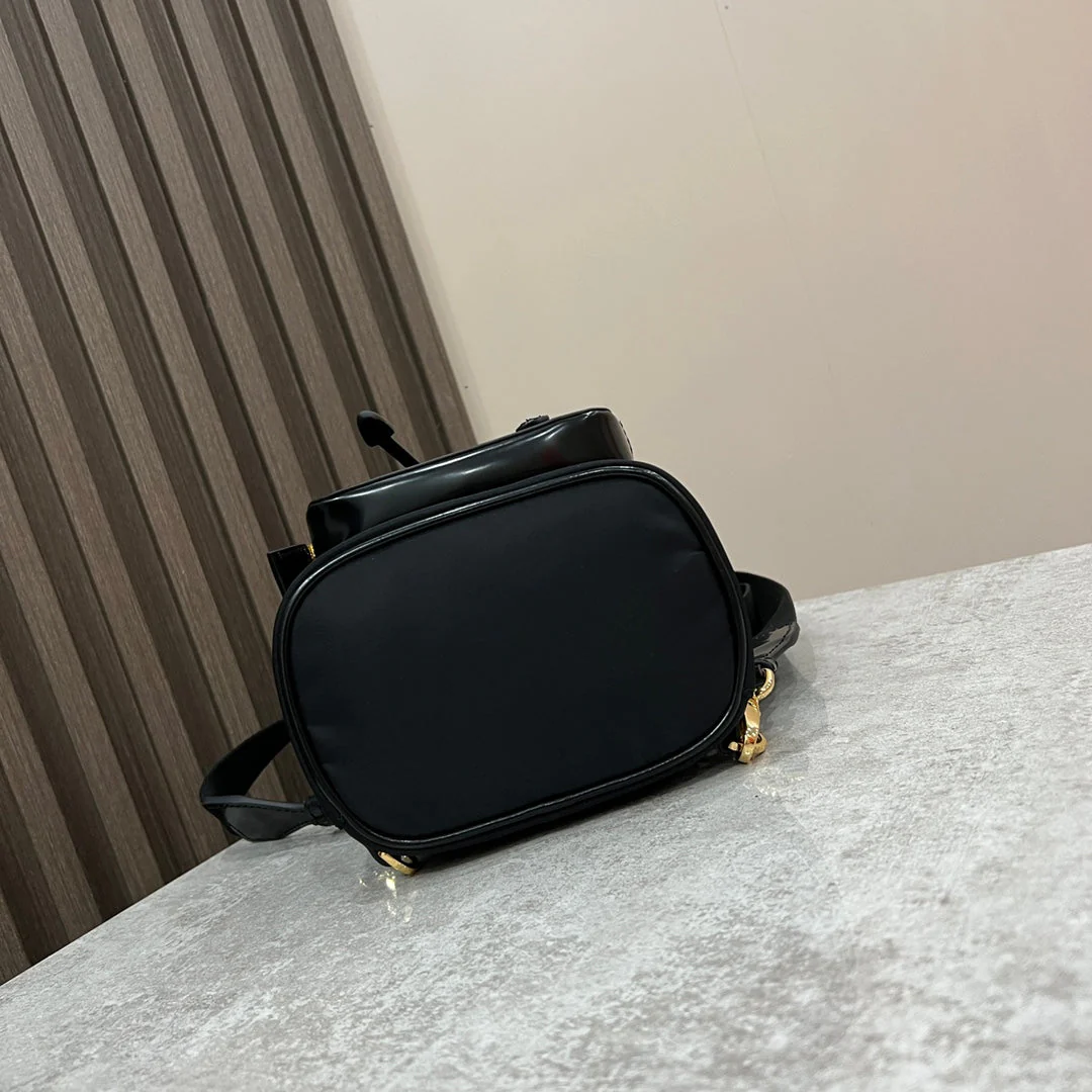 Prada MINI BACKPACK 18 IN BLACK RE-NYLON AND GLOSSY CALFSKIN GOLD HARDWARE