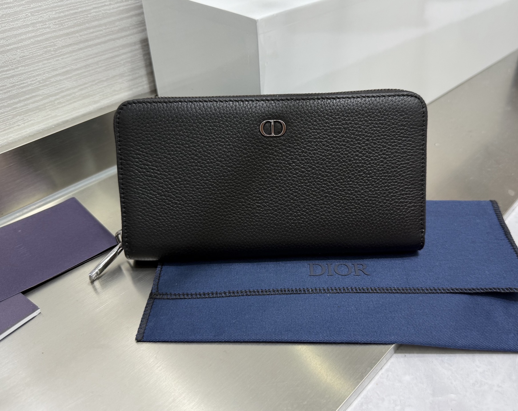 Dior Zip around Wallet in Black Grained leather