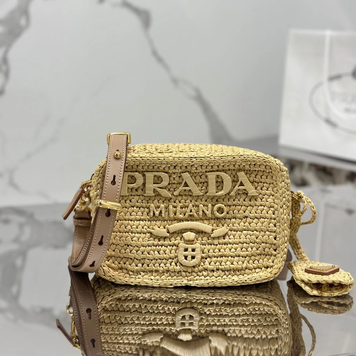 Prada CAMERA BAG 20 IN BEIGE WOVEN RAFFIA