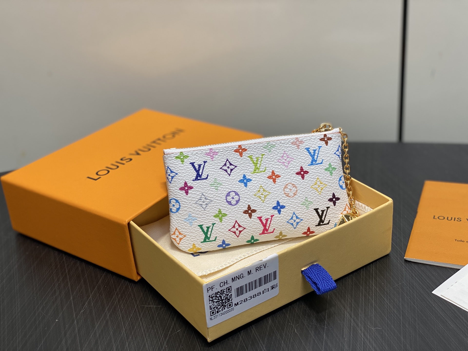 M28388  LV x TM Key Pouch White multicolored canvas