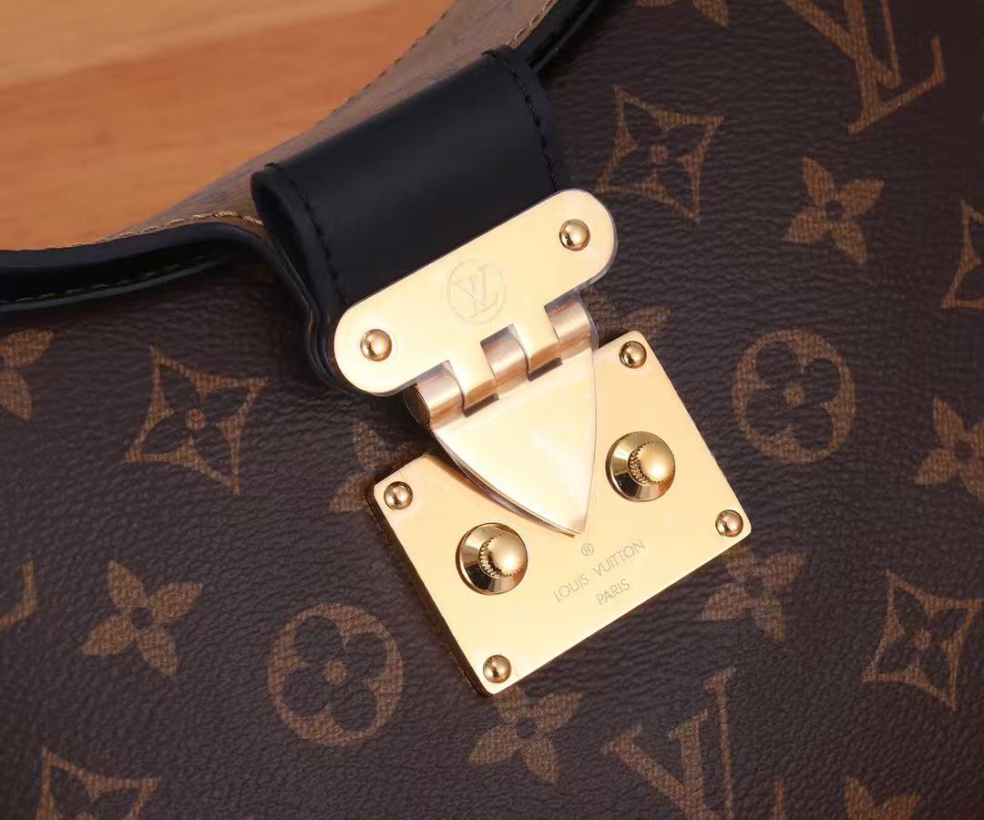 Louis Vuitton Monogram Reverse printed canvas crossbody bag