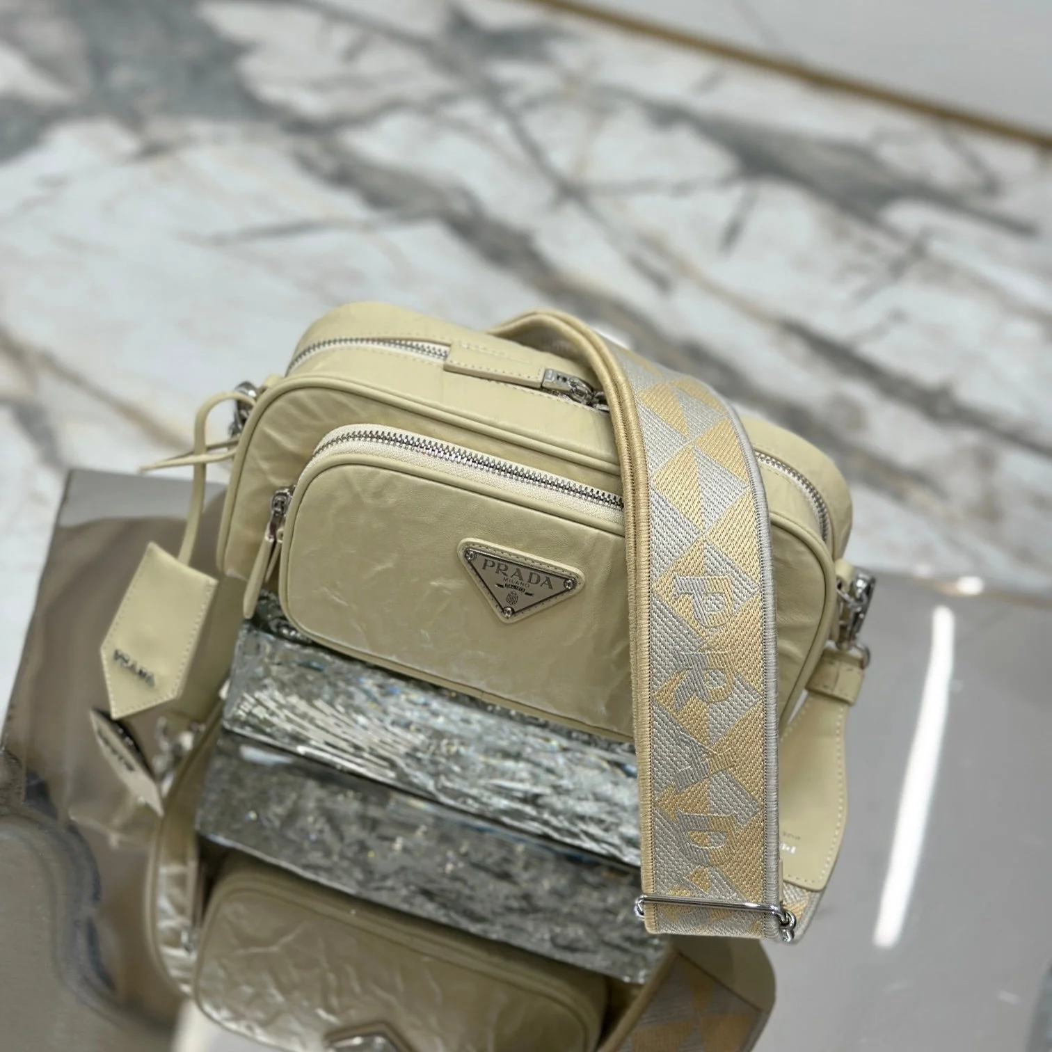 Prada CAMERA BAG 23 IN CREAM WRINKLED LAMBSKIN