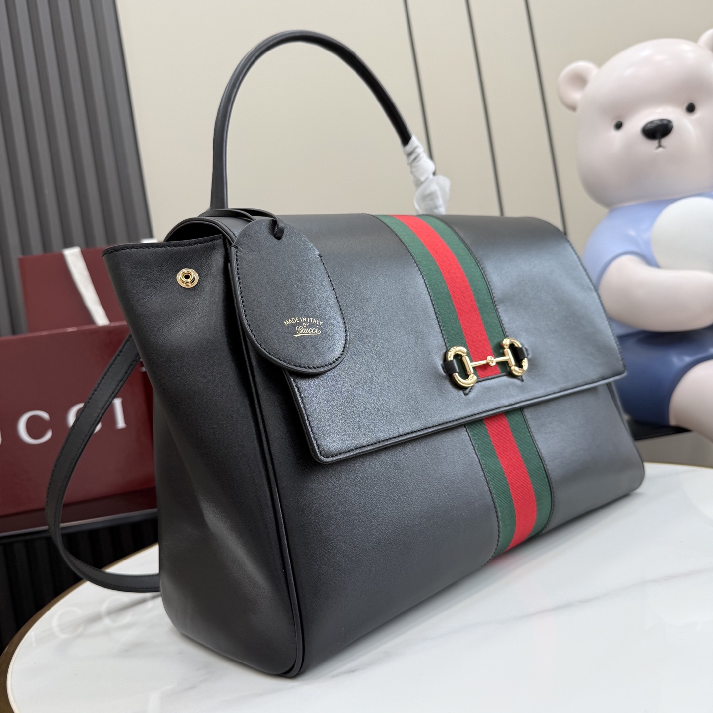 Gucci Paparazzo large top handle bag 875019