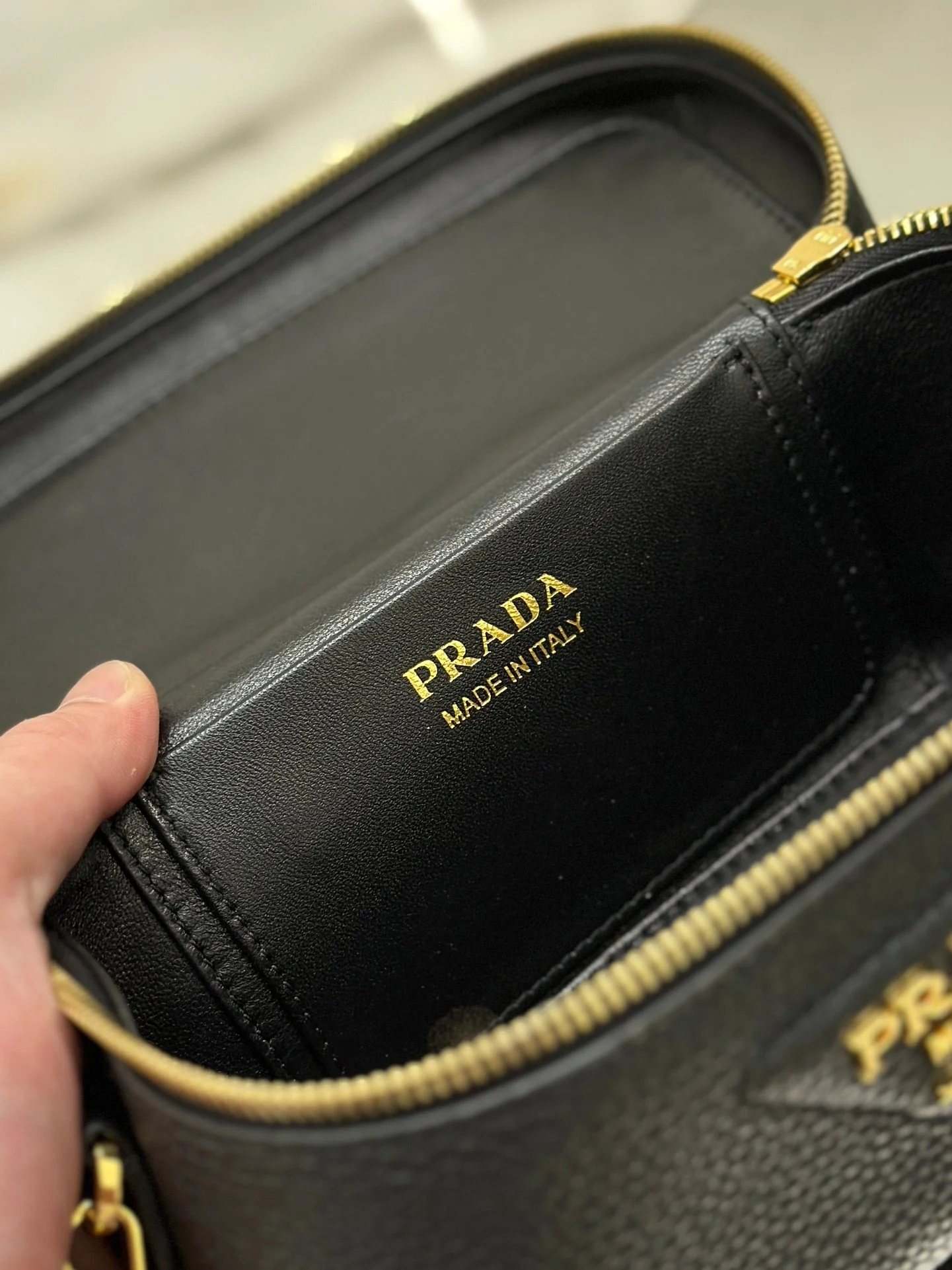 Prada VANITY CASE 18 IN BLACK GRAINED CALFSKIN GOLD HARDWARE