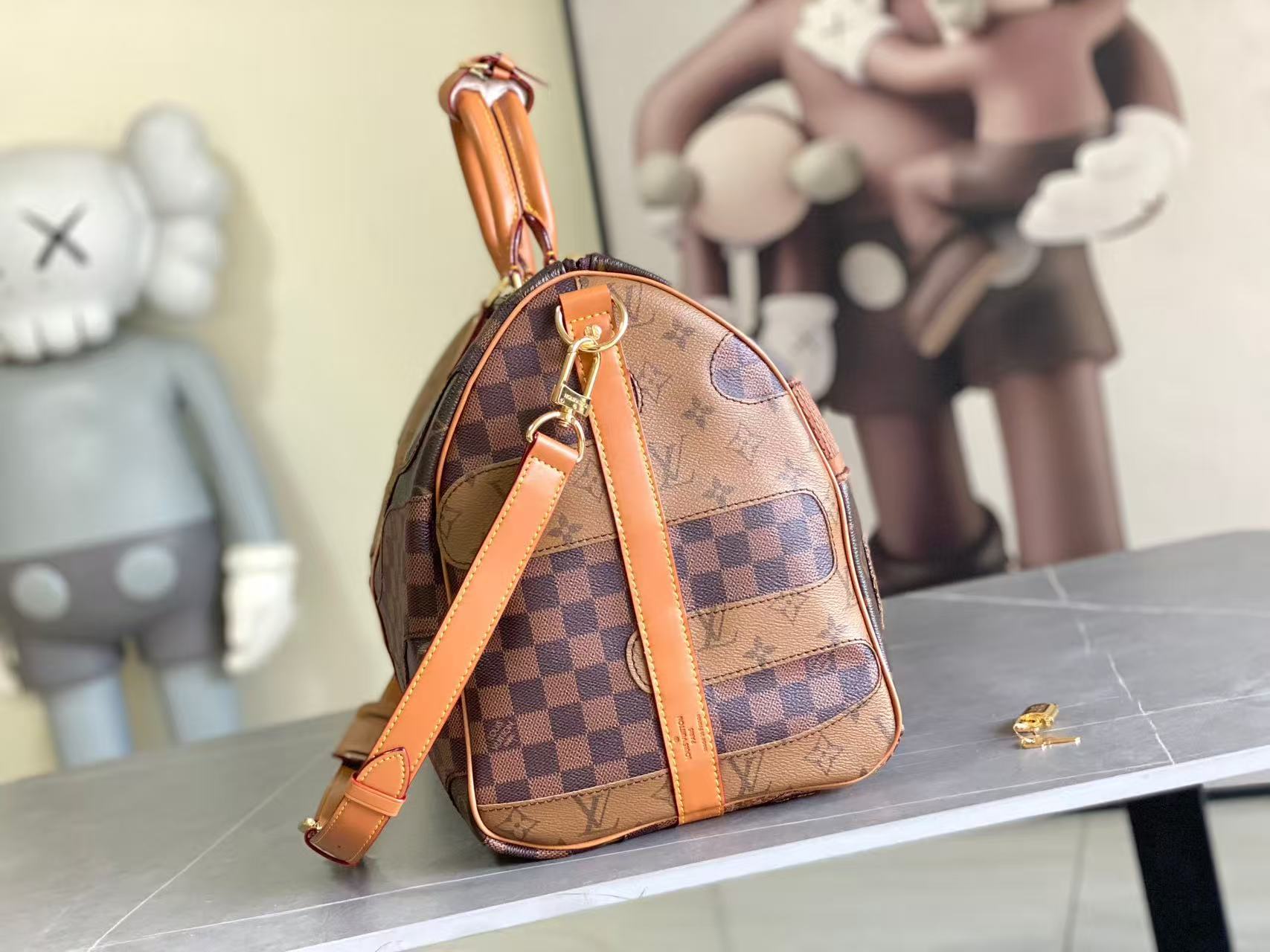 Louis Vuitton LV Keepall Bandouli è re 50 travel bag