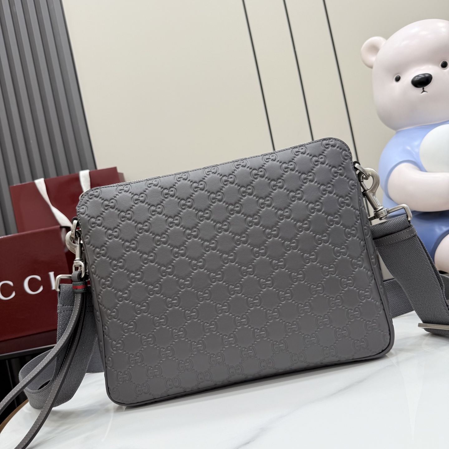 Gucci GG Emblem medium crossbody bag 850214