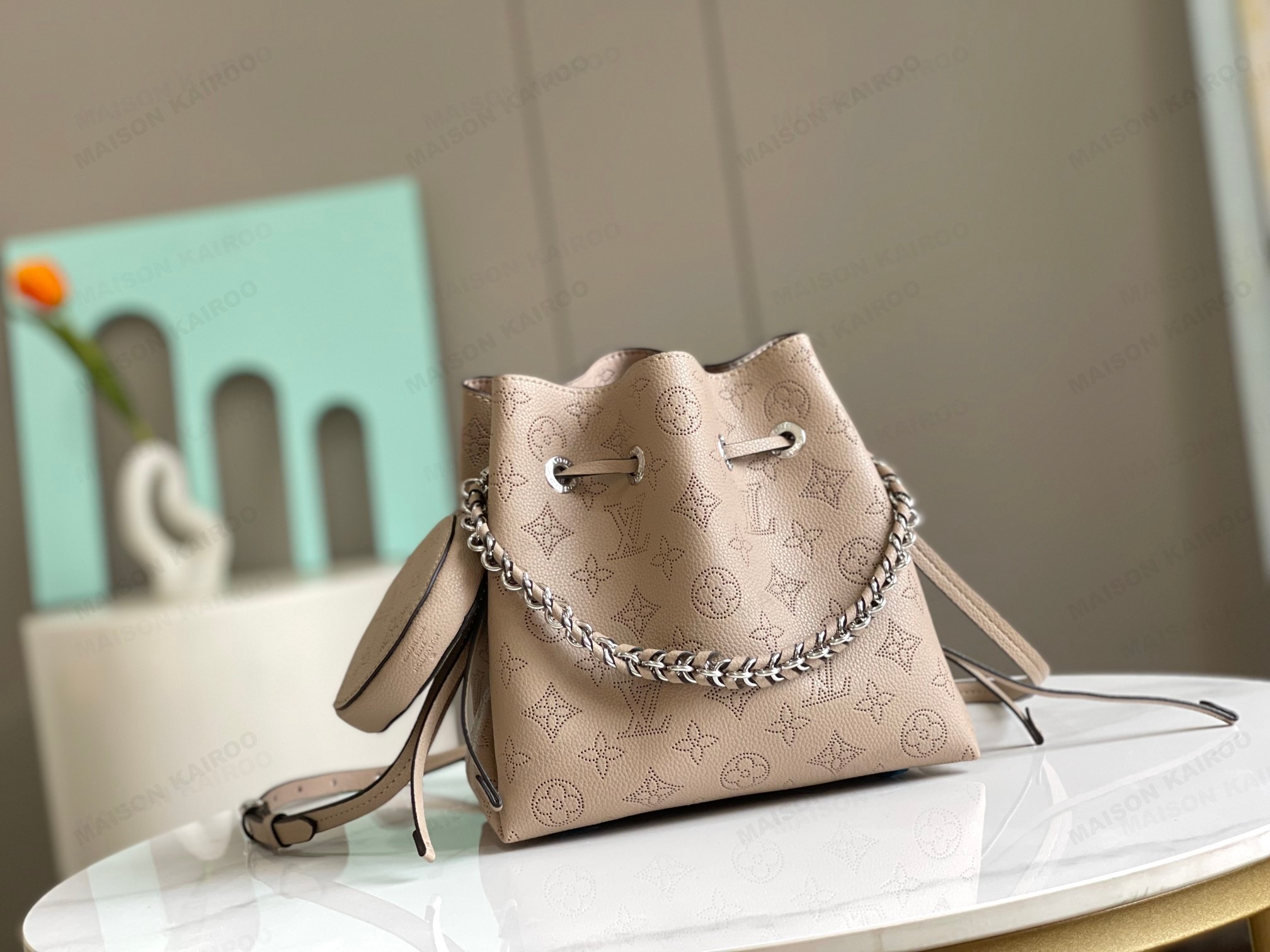 Louis Vuitton LV Mahina Bella Taupe Dense Perforated Monogram Leather Drawstring Bucket Handle Shoulder Bag - KAIROO