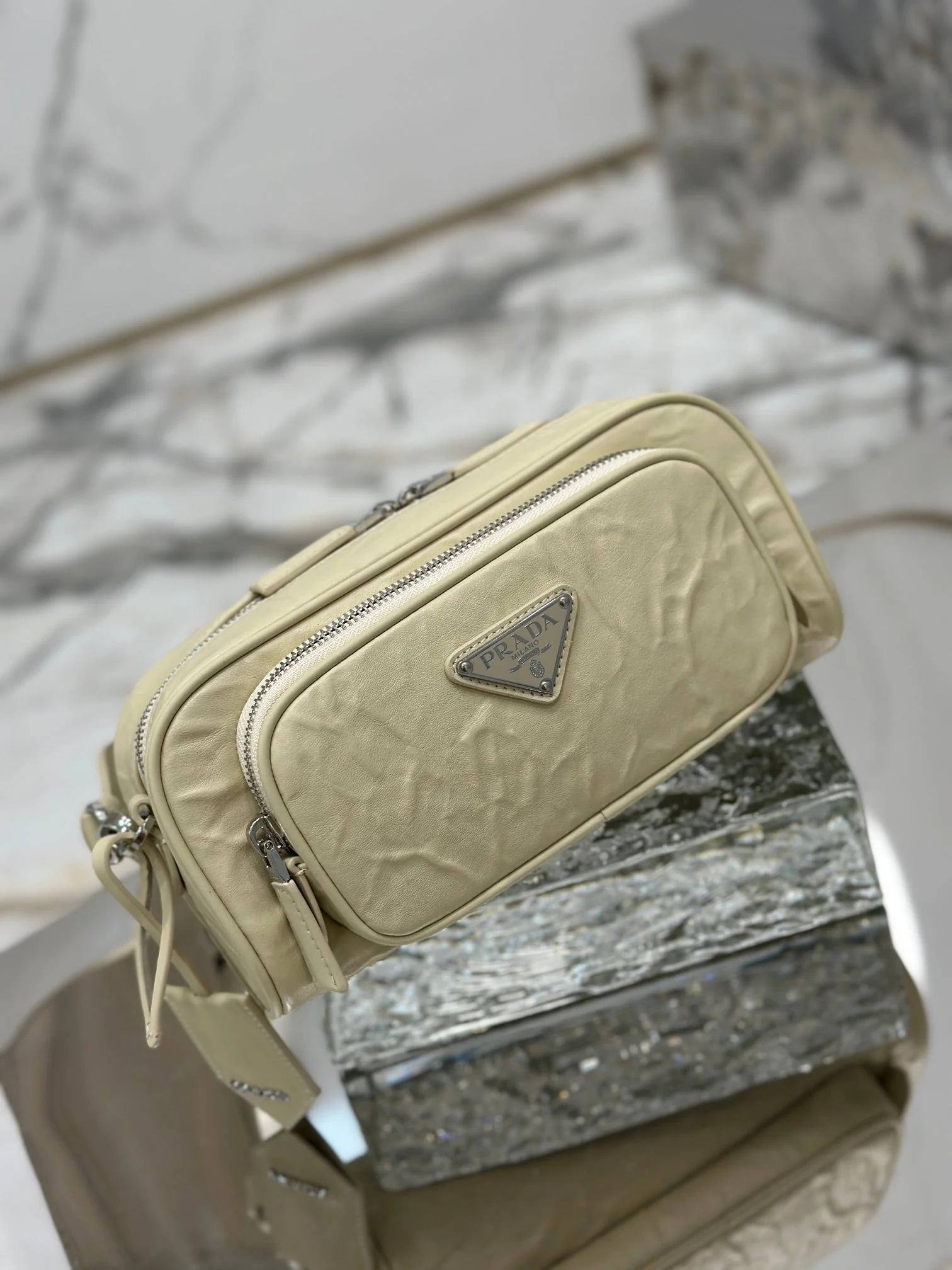Prada CAMERA BAG 23 IN CREAM WRINKLED LAMBSKIN