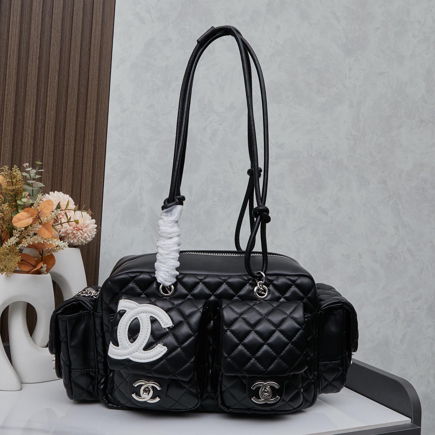 Chanel Black and white motorcycle bag