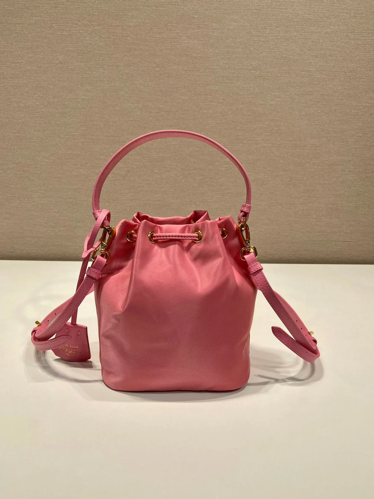 Prada BUCKET BAG 19 IN CANDY PINK RE-NYLON AND SAFFIANO LEATHER HANDLE