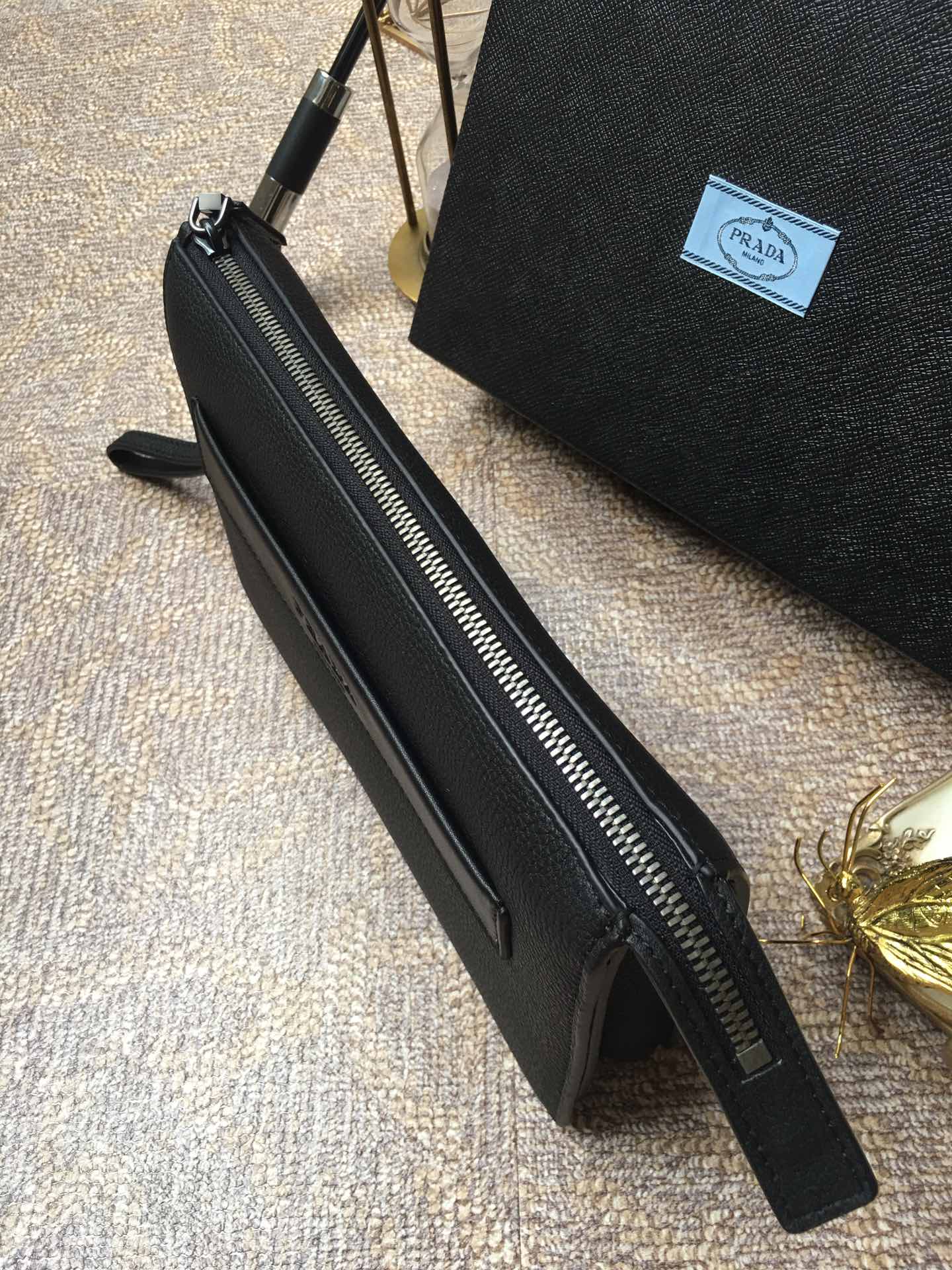 Prada CLUTCH 26 IN BLACK DEERSKIN EMBOSSED LOGO