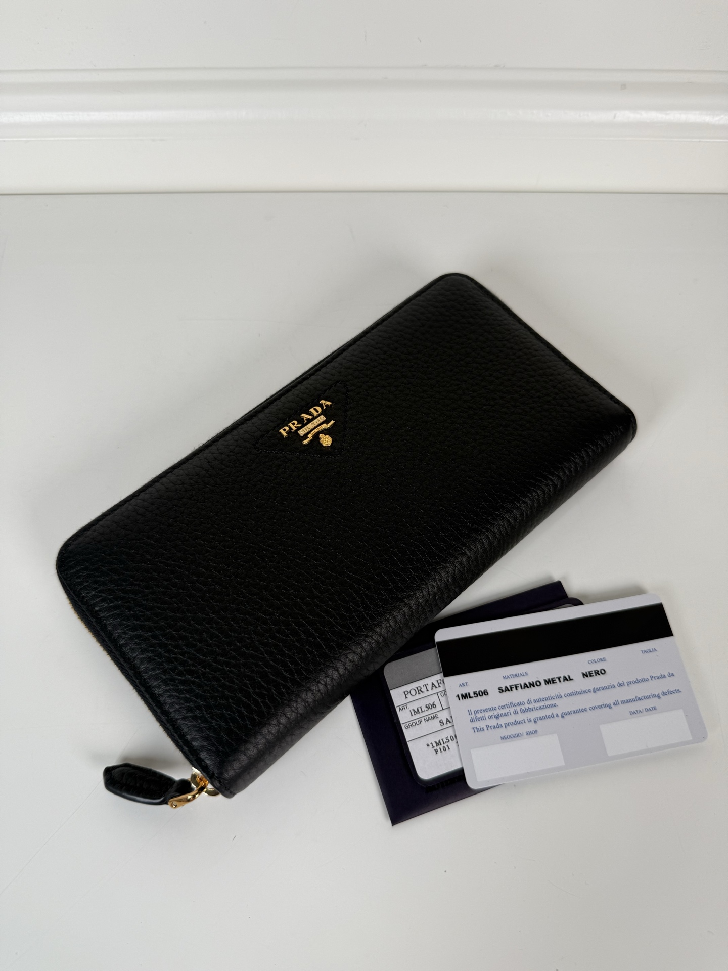 Prada Large Zippy Wallet in Black grained calfskin