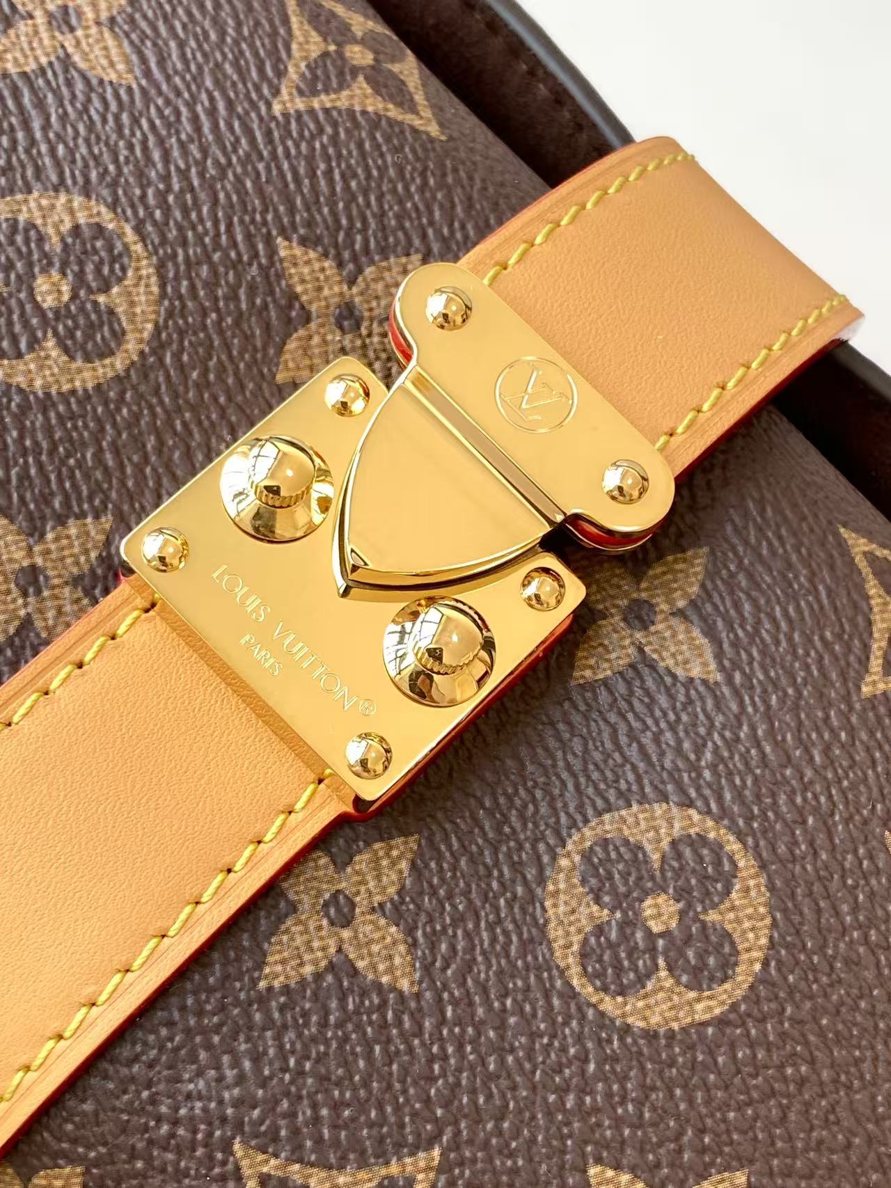 Louis Vuitton Pochette Mia Handbag