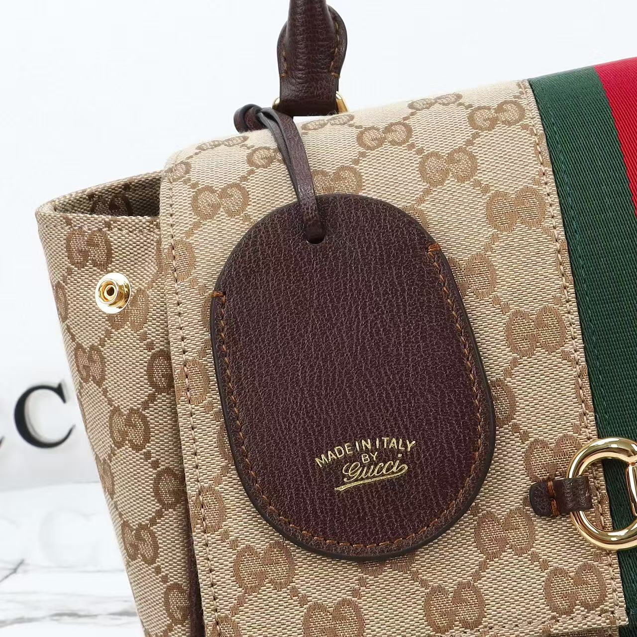 GUCCI Paparazzo medium top handle bag