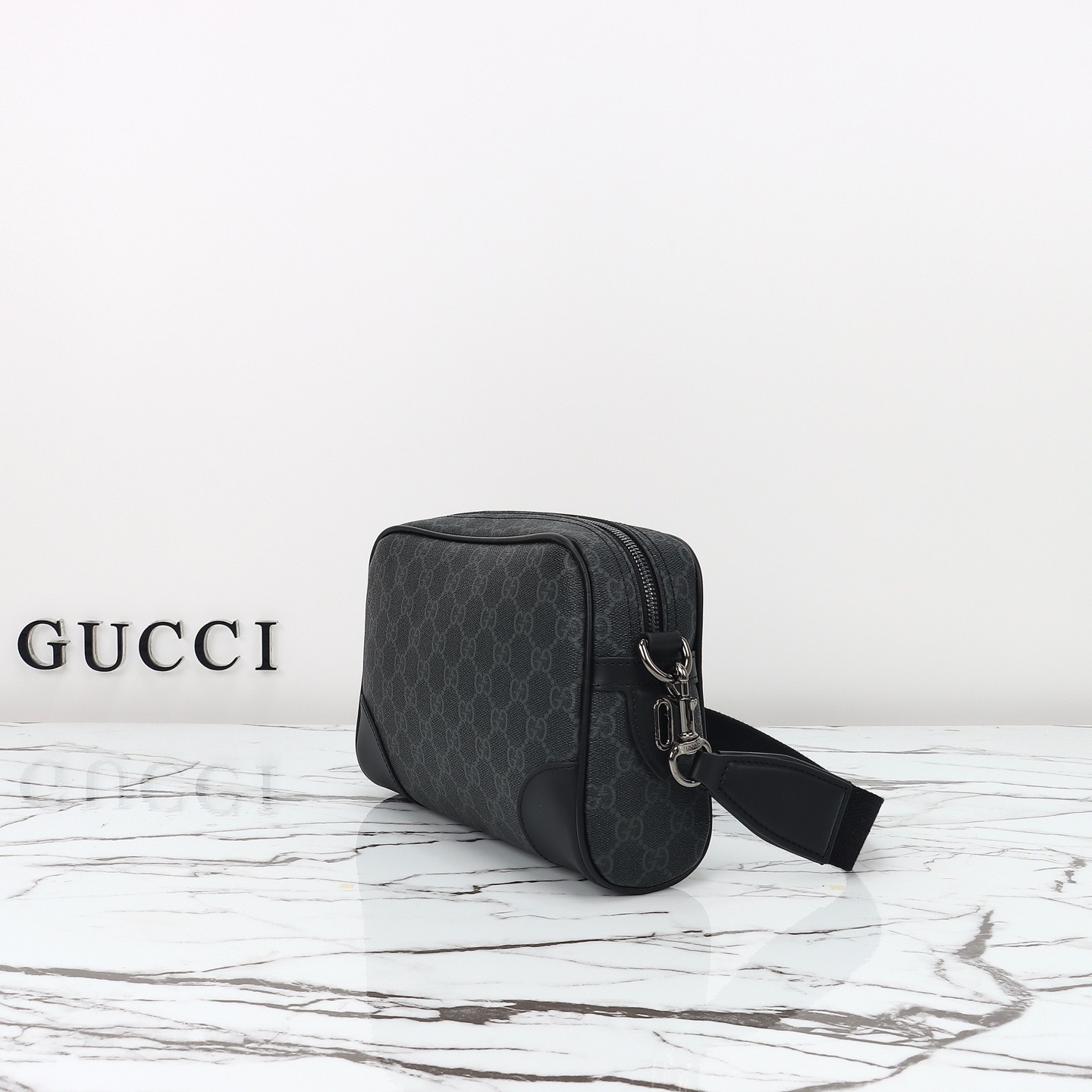 GUCCI Emblem GG small crossbody bag