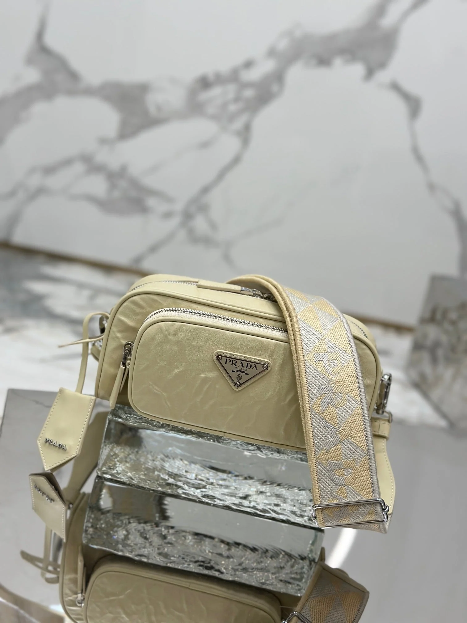 Prada CAMERA BAG 23 IN CREAM WRINKLED LAMBSKIN