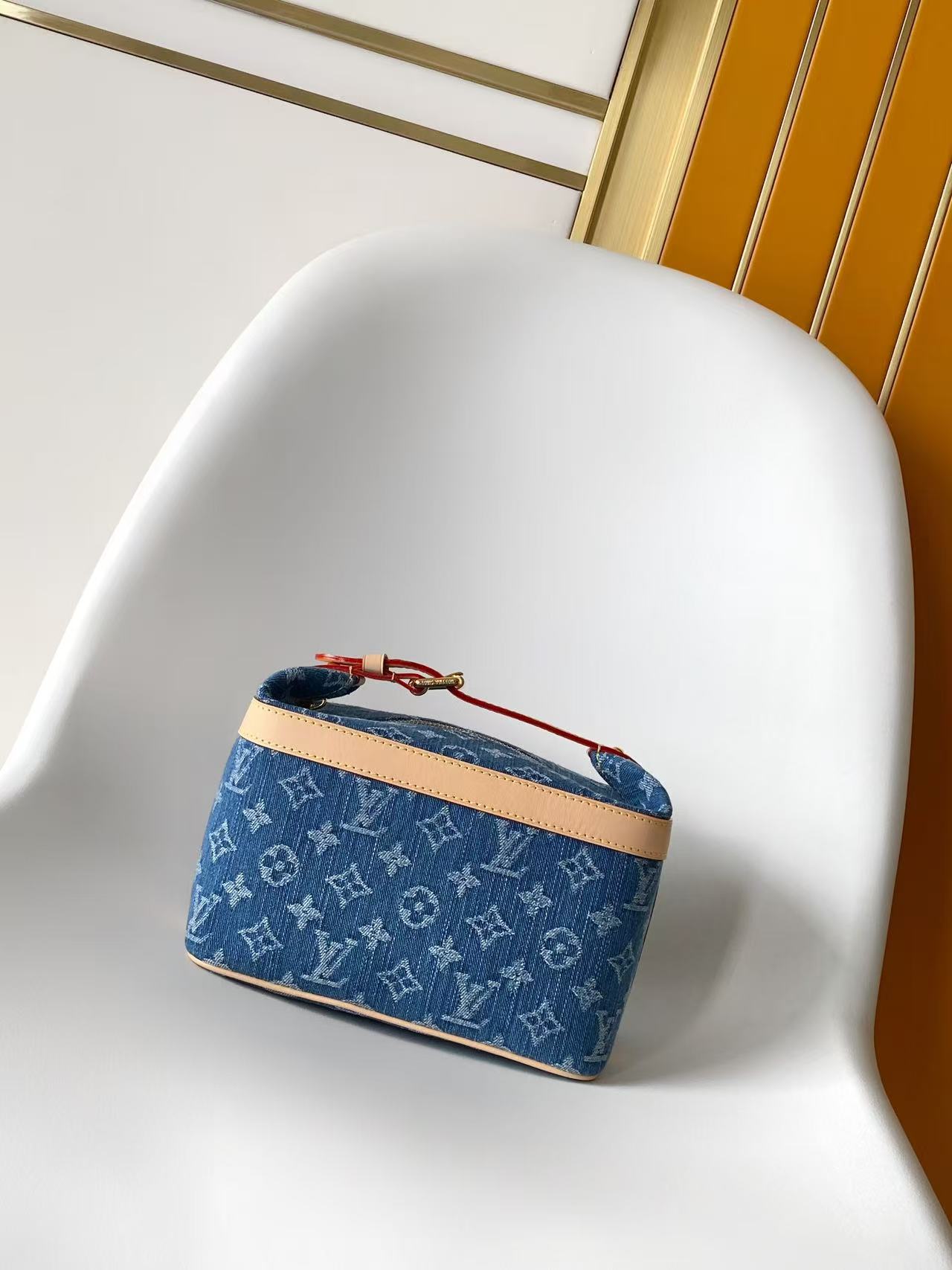 M27945 LV Cruiser Toiletry Bag in Blue Monogram Denim