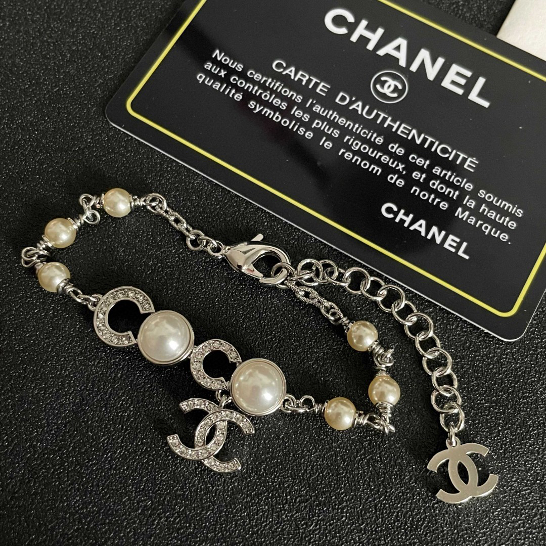 Chanel Silver COCO Faux Pearl Crystal CC Charm Bracelet - KAIROO