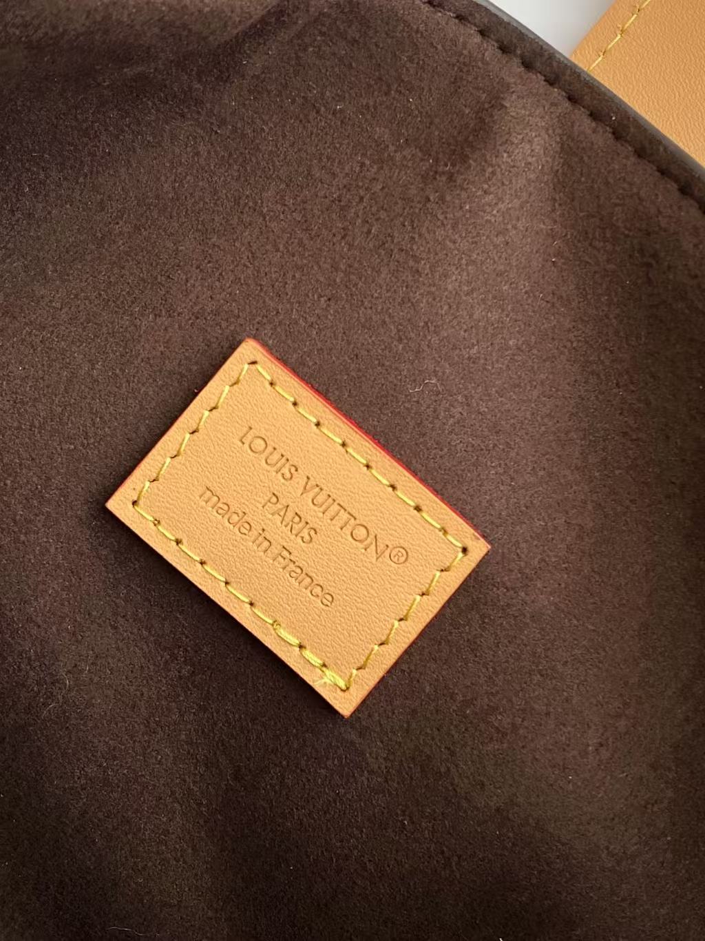Louis Vuitton Pochette Mia Handbag