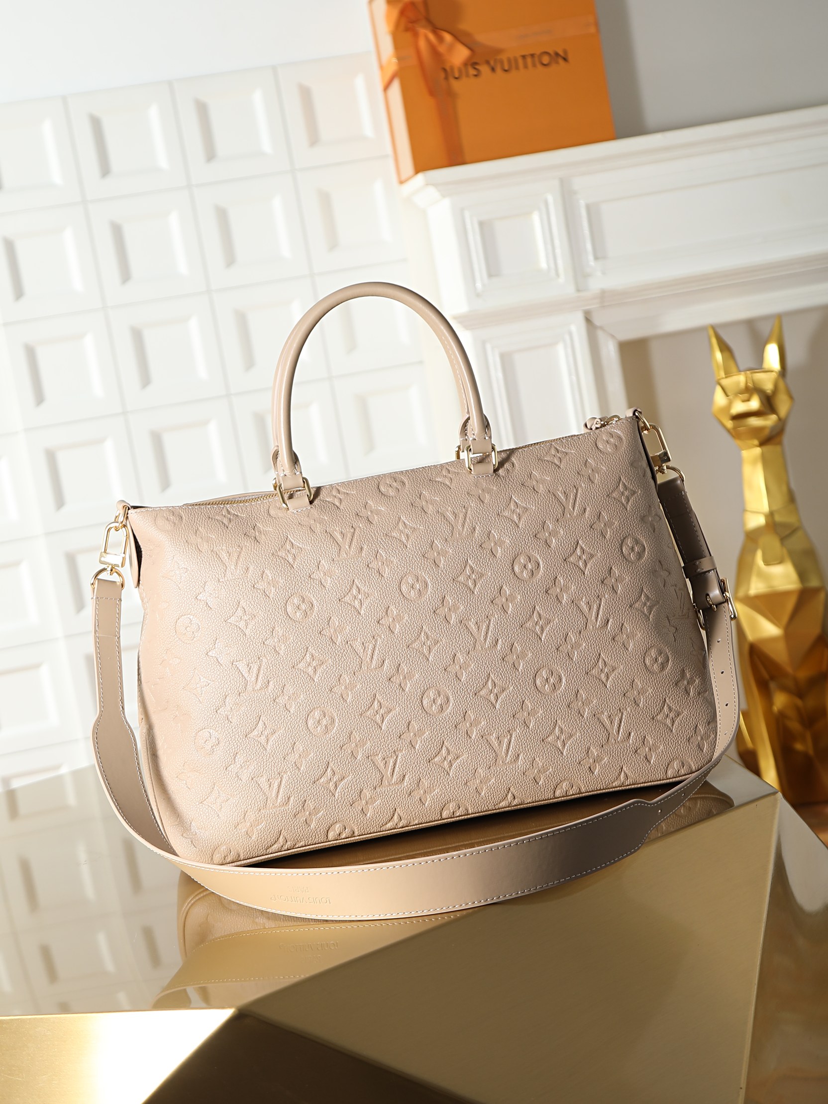 Louis Vuitton Skyline MM handbag in apricot color