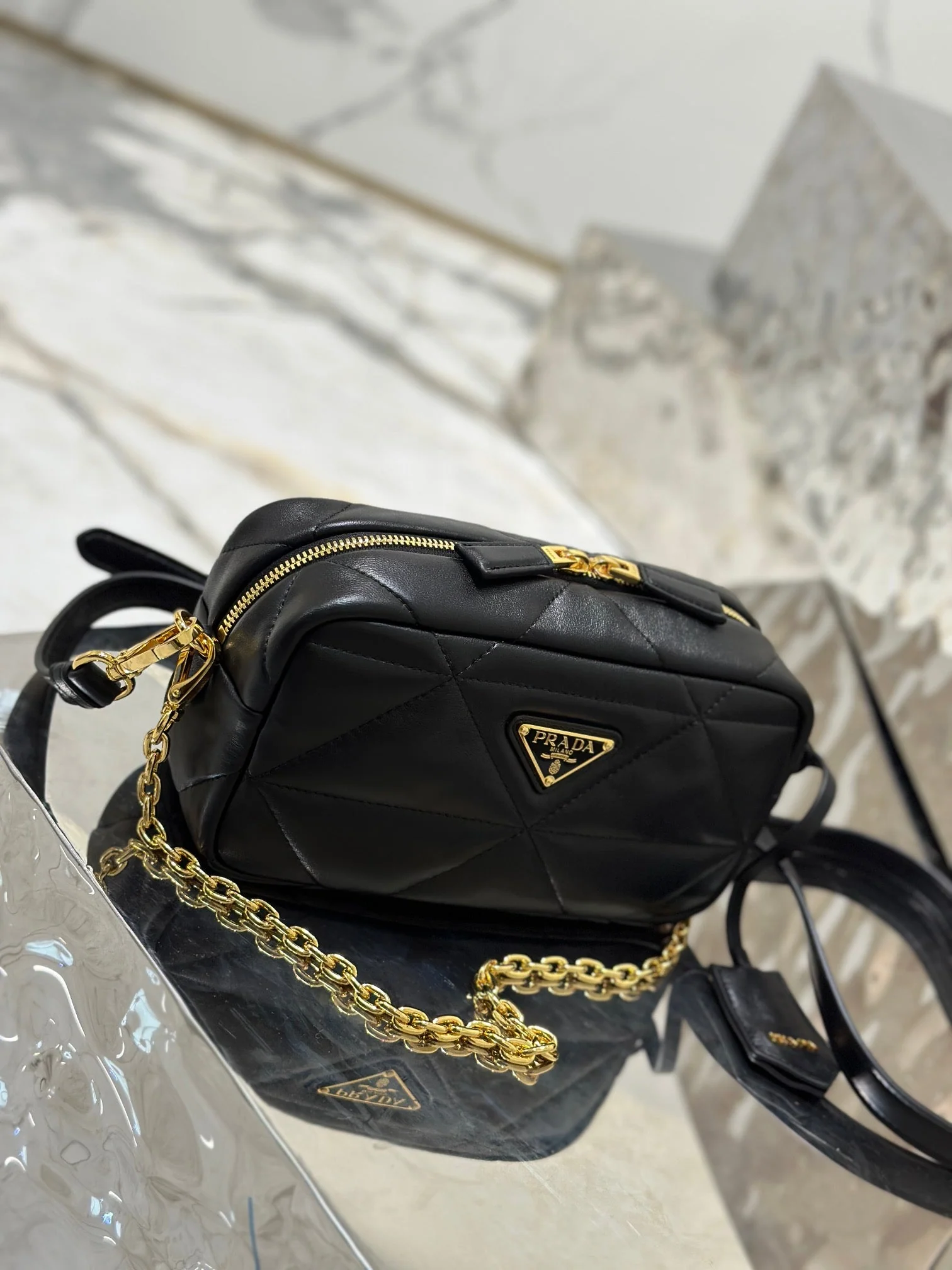 Prada CAMERA BAG 22 IN BLACK TRIANGLE PATTERN QUILTED LAMBSKIN GOLD HARDWARE