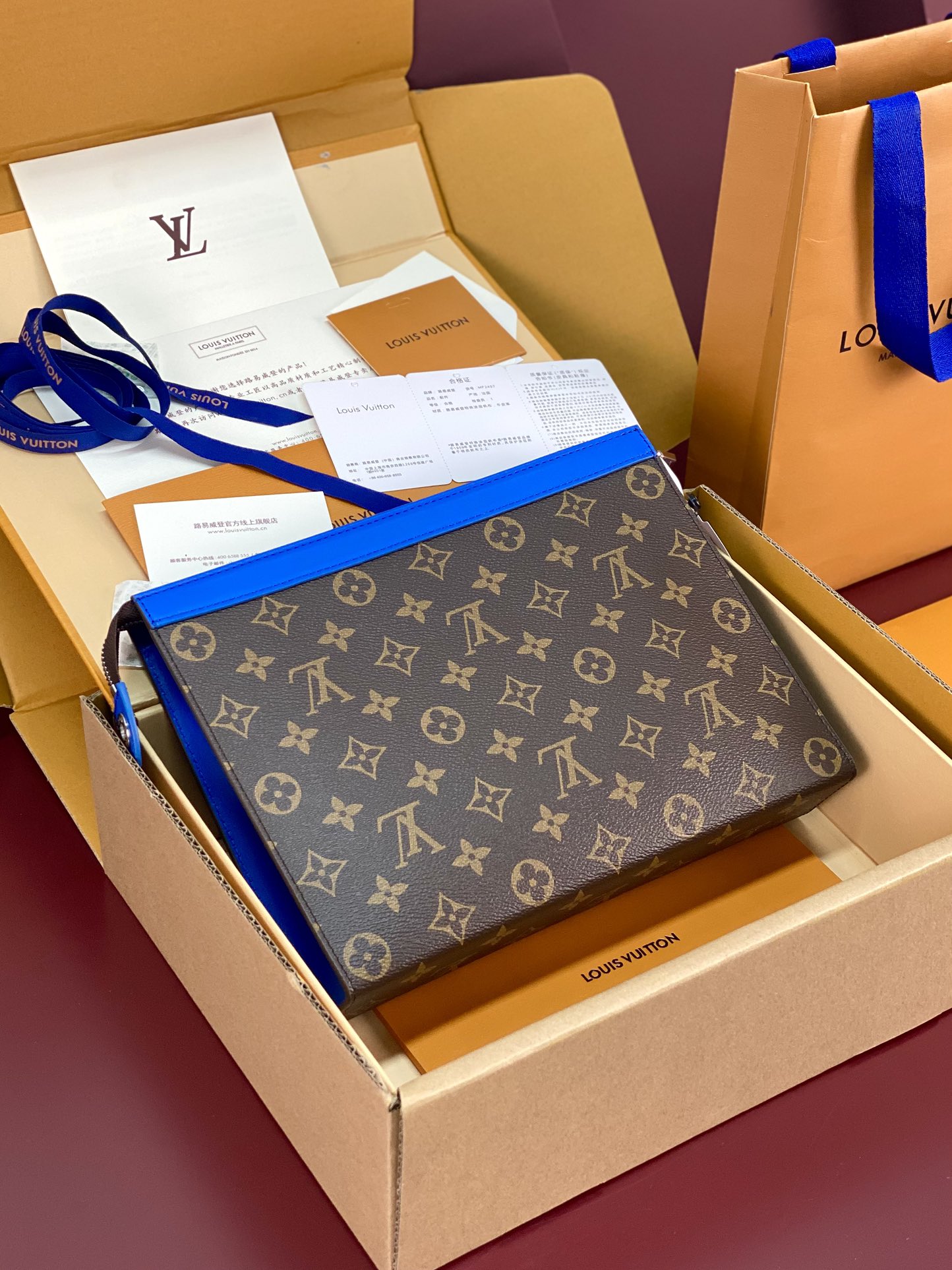 M12819 Pochette Voyage MM in Gaston Pondichery Indigo Blue Monogram Macassar  canvas