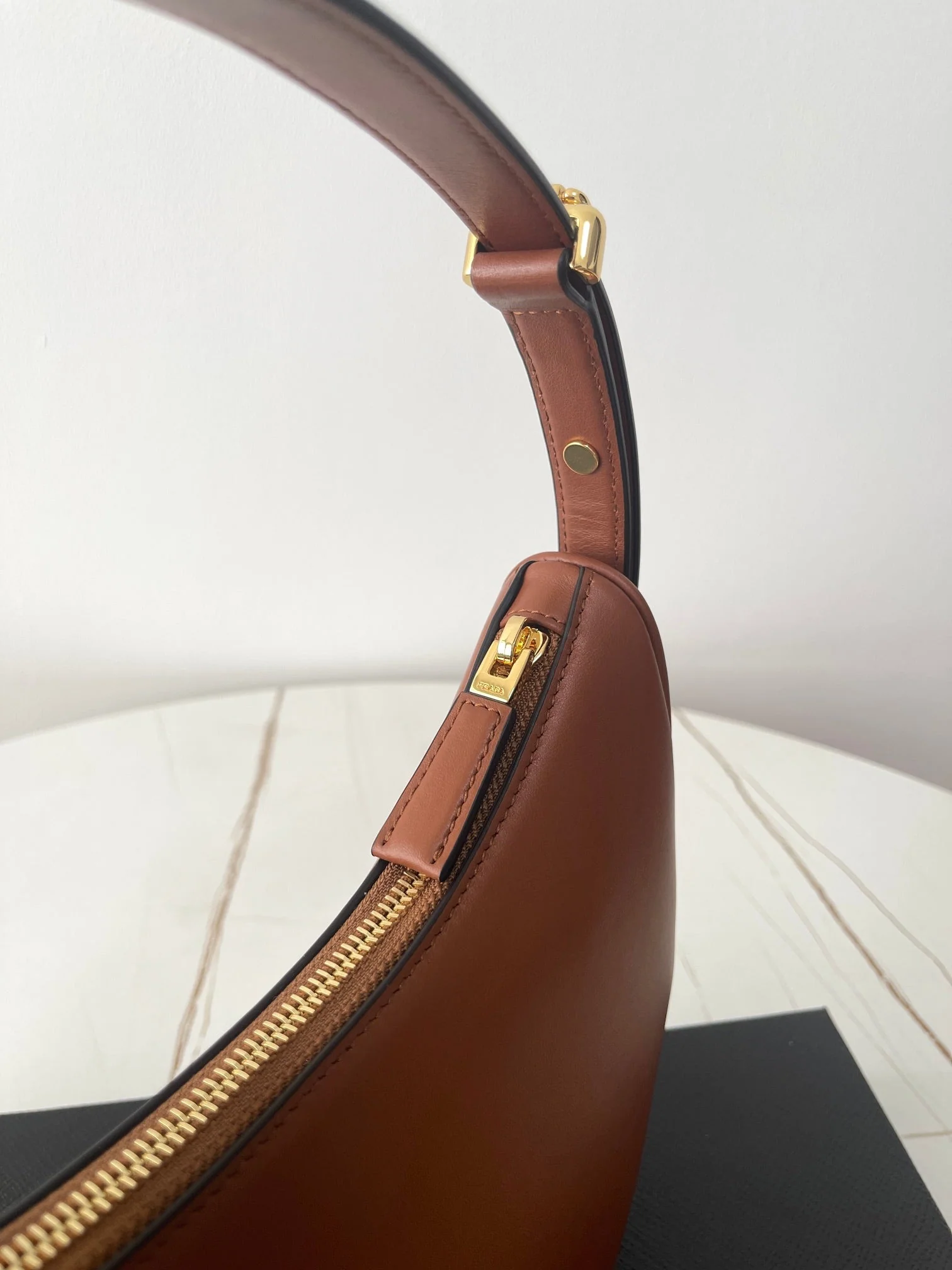 Prada ARQUÉ 22 SHOULDER BAG IN COGNAC BROWN LEATHER