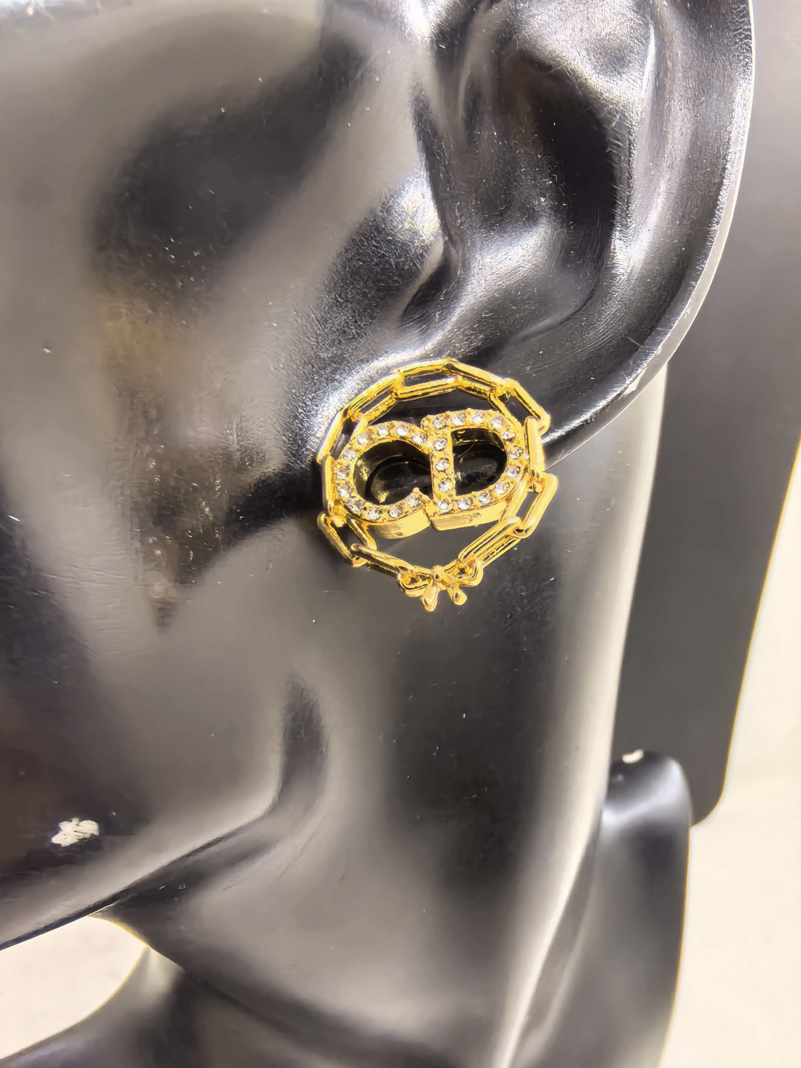 Dior Hollow Round CD Stud Earrings