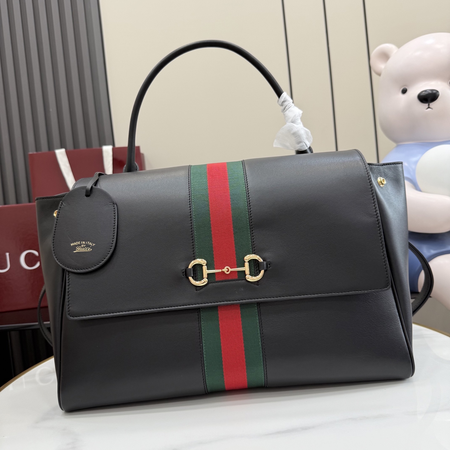 Gucci Paparazzo large top handle bag 875019
