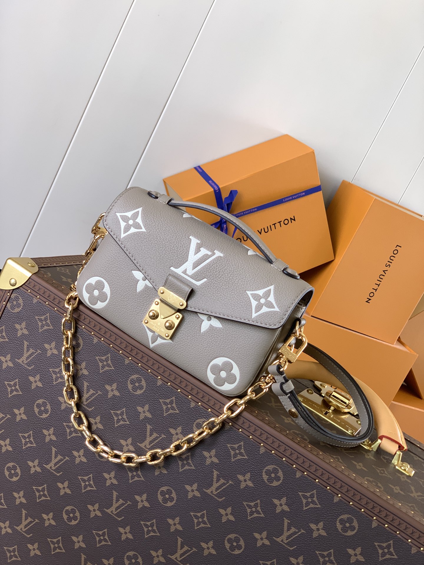 M23081 Pochette Métis East West Bag in Tourterelle Bicolor Monogram Empreinte leather