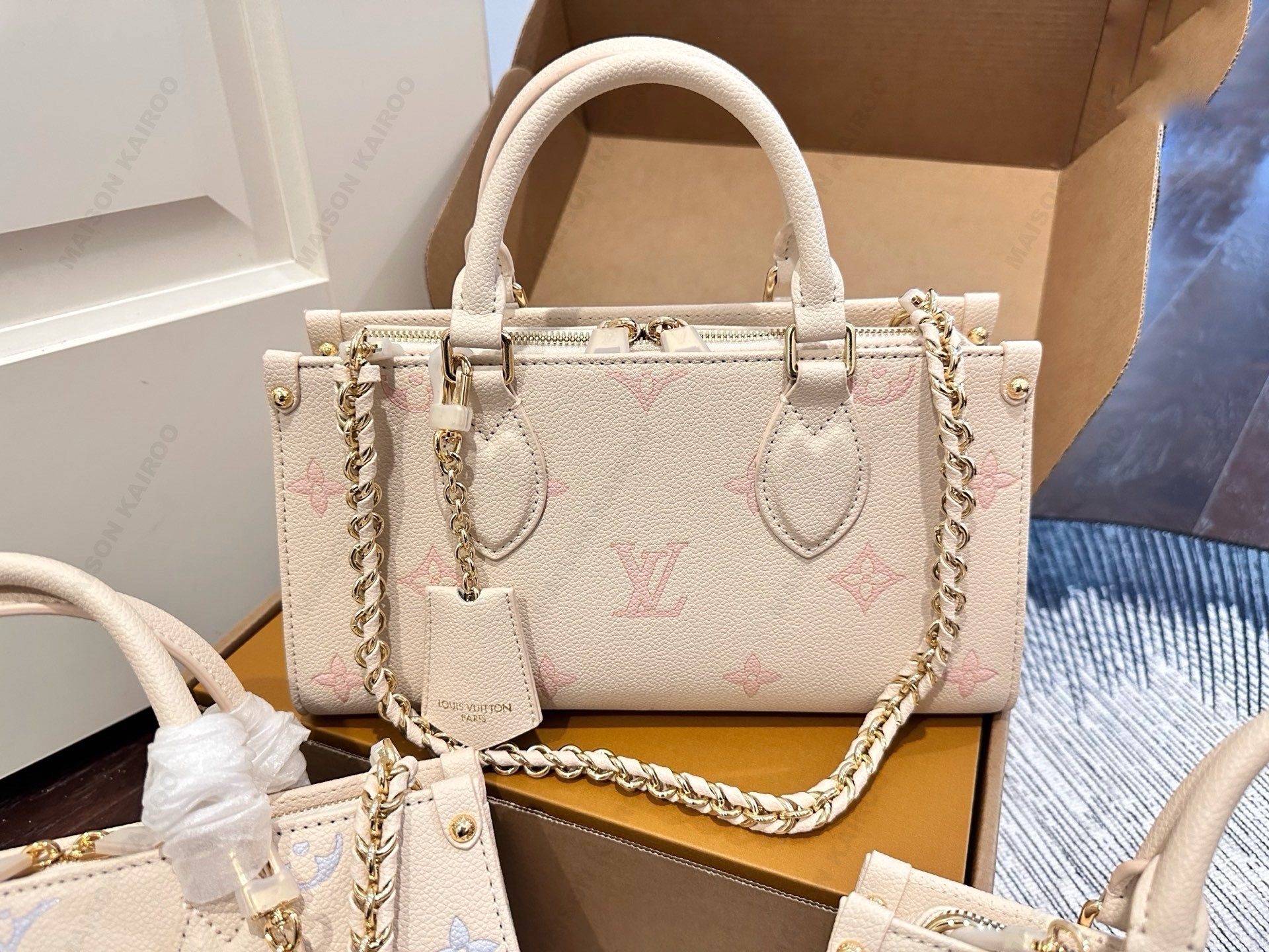 Louis Vuitton LV OnTheGo East West Pastel Monogram Small Embossed Leather Chain Top Handle Tote Bag - KAIROO