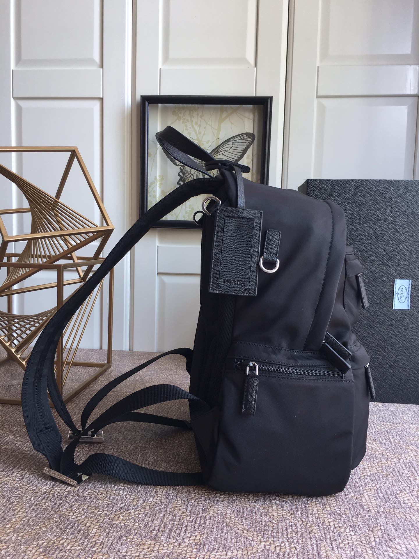 Prada  TRIANGLE LOGO BACKPACK 40 IN BLACK RE-NYLON