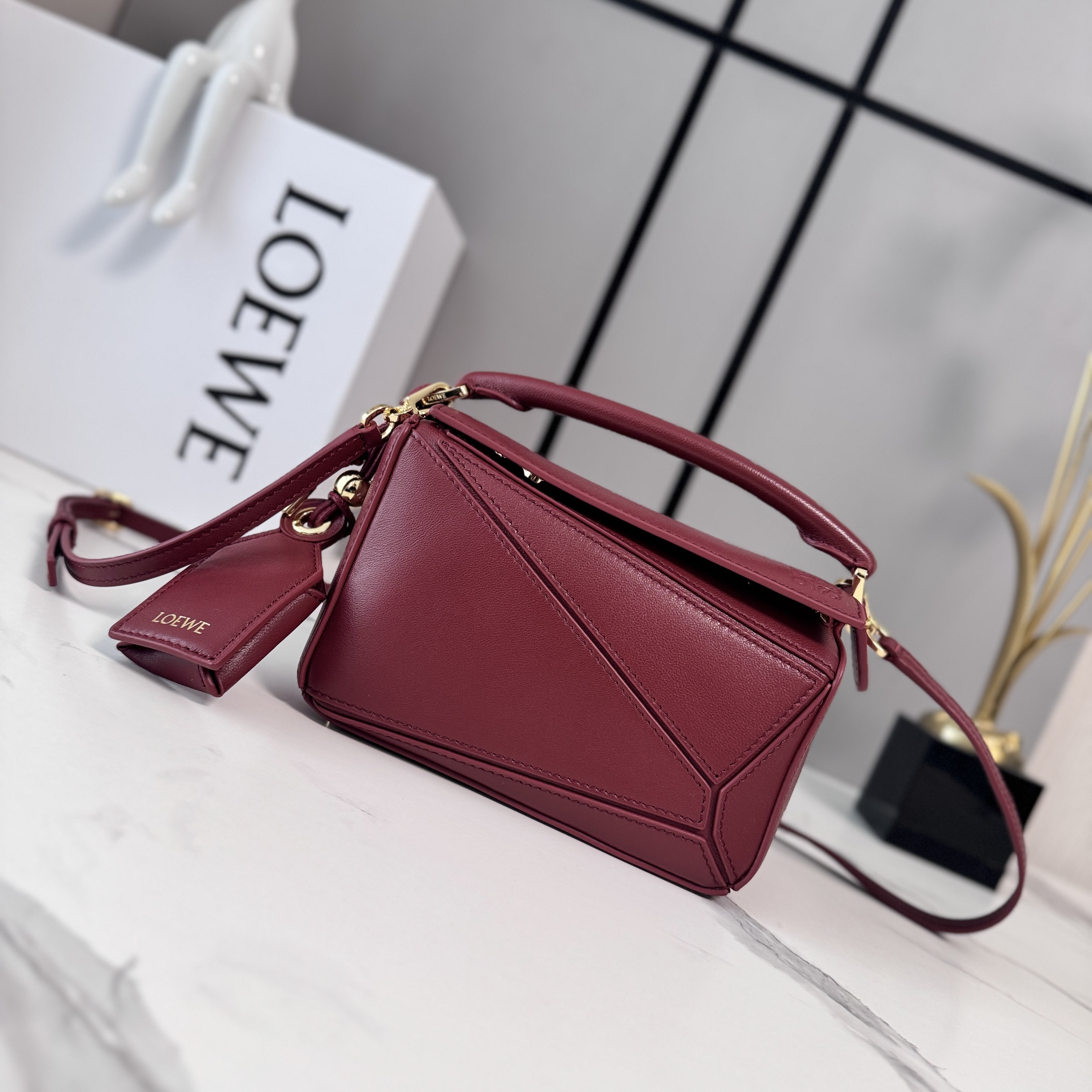 Loewe Mini Featherlight Puzzle bag in nappa lambskin-Rouge