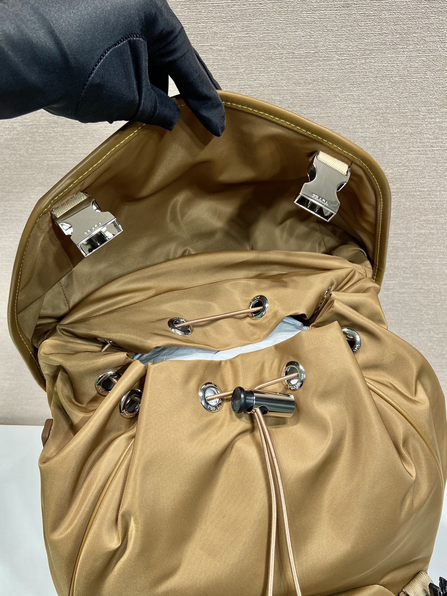 Prada BACKPACK 45 IN CIDER BROWN RE-NYLON AND CALFSKIN TRIM