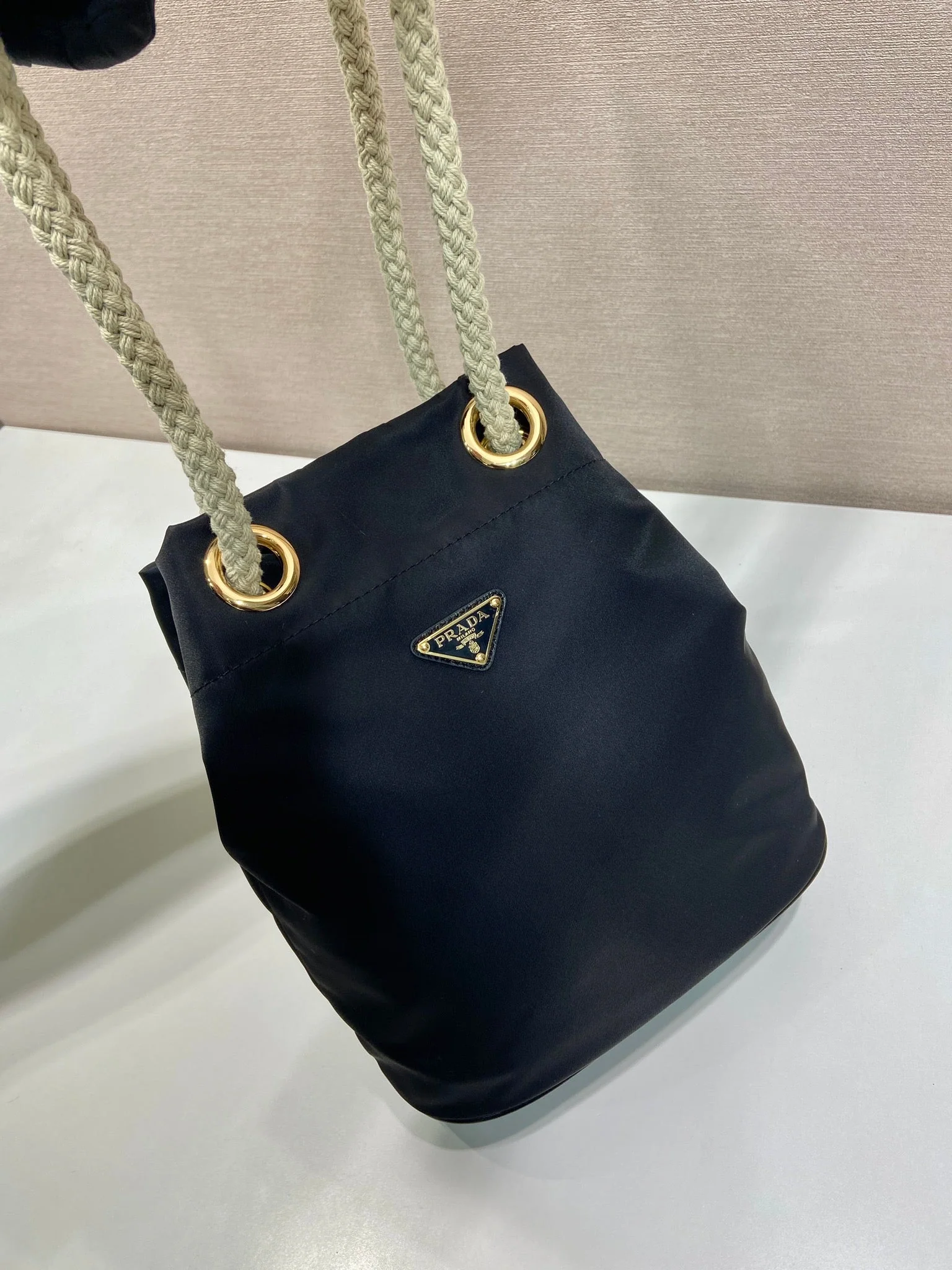 Prada BUCKET BAG 28 IN BLACK RE-NYLON GOLD LOGO