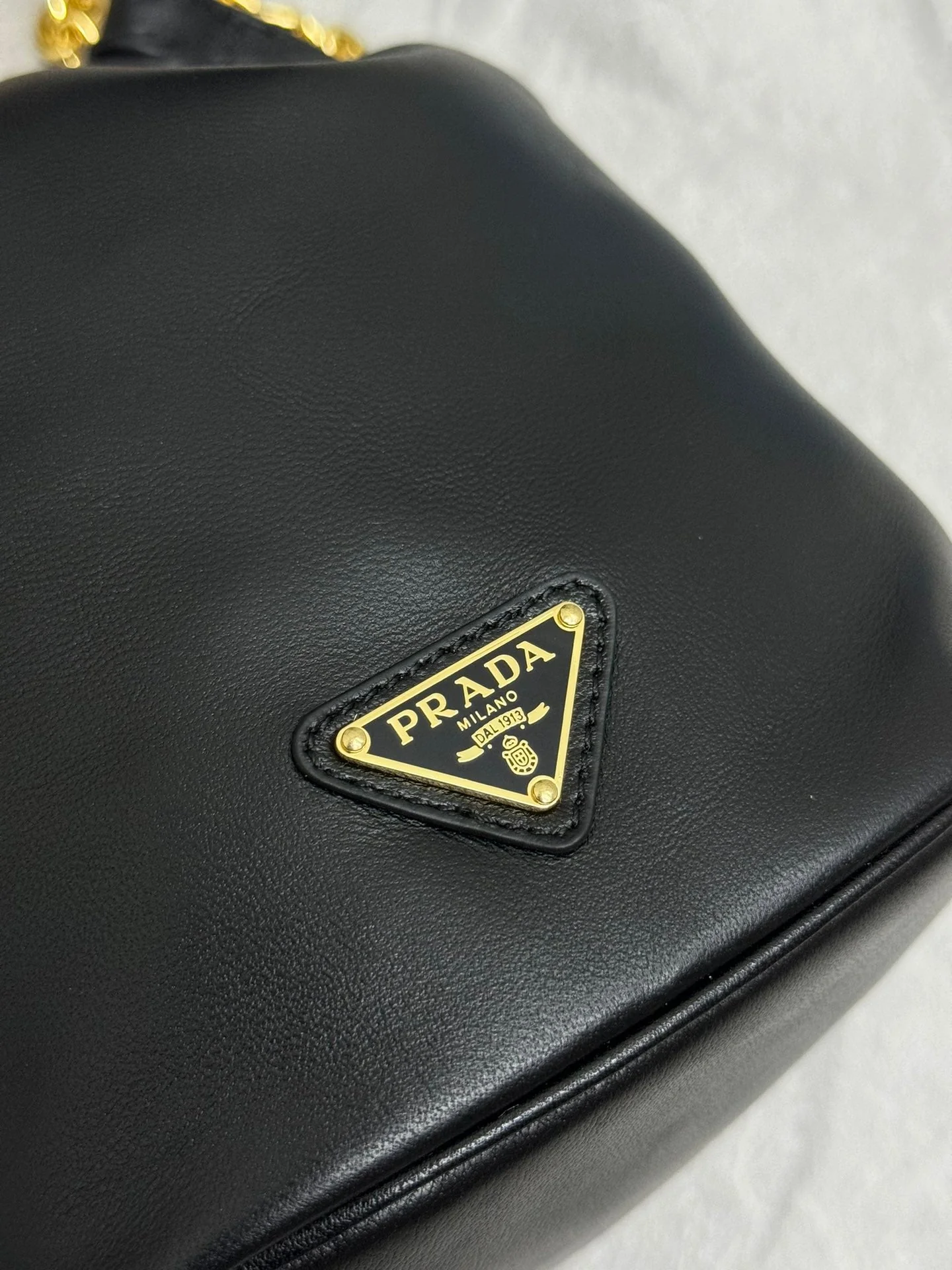 Prada MINI BUCKET BAG 19 IN BLACK SOFT NAPPA LAMBSKIN GOLD HARDWARE