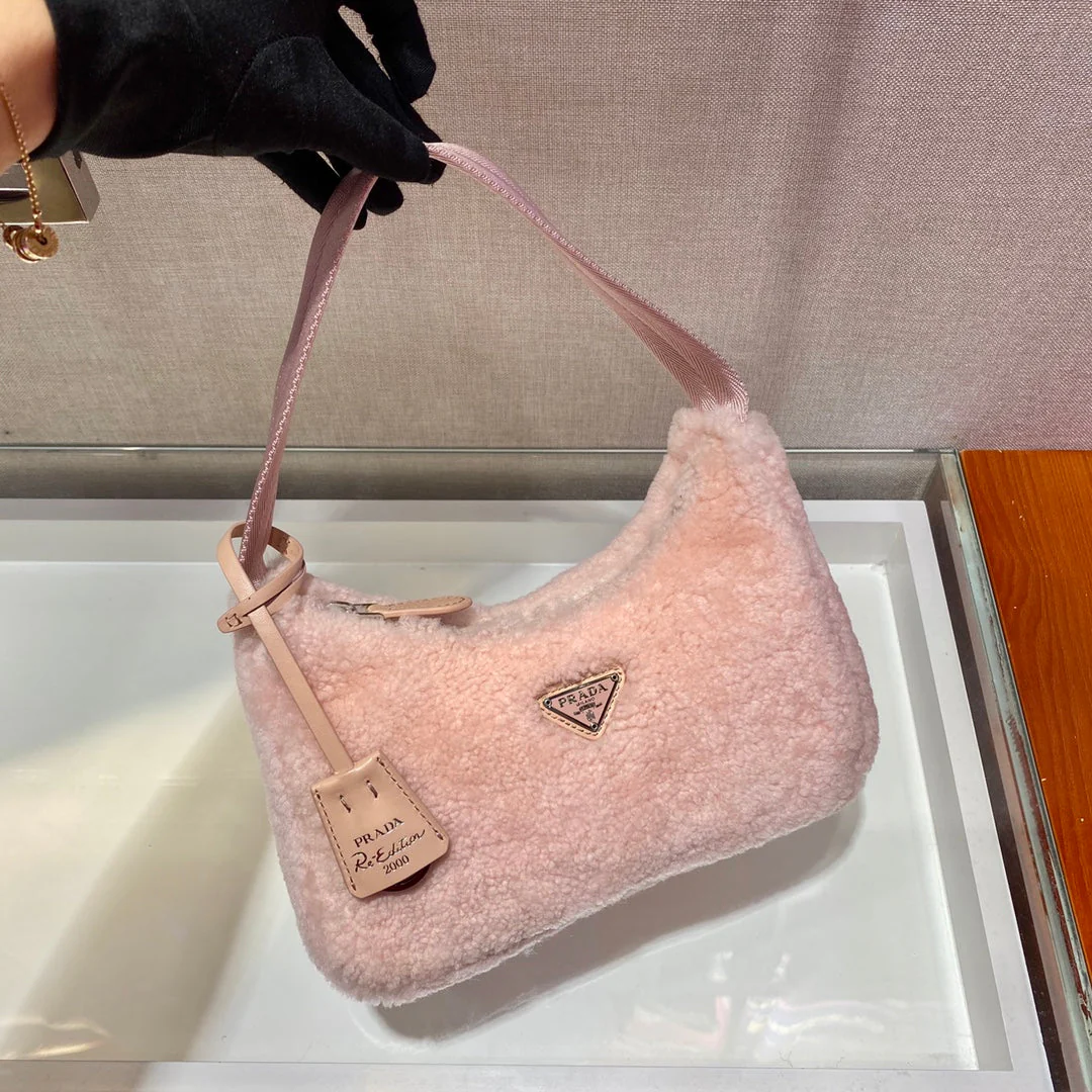 Prada HOBO BAG 23 IN LIGHT PINK SHEARLING