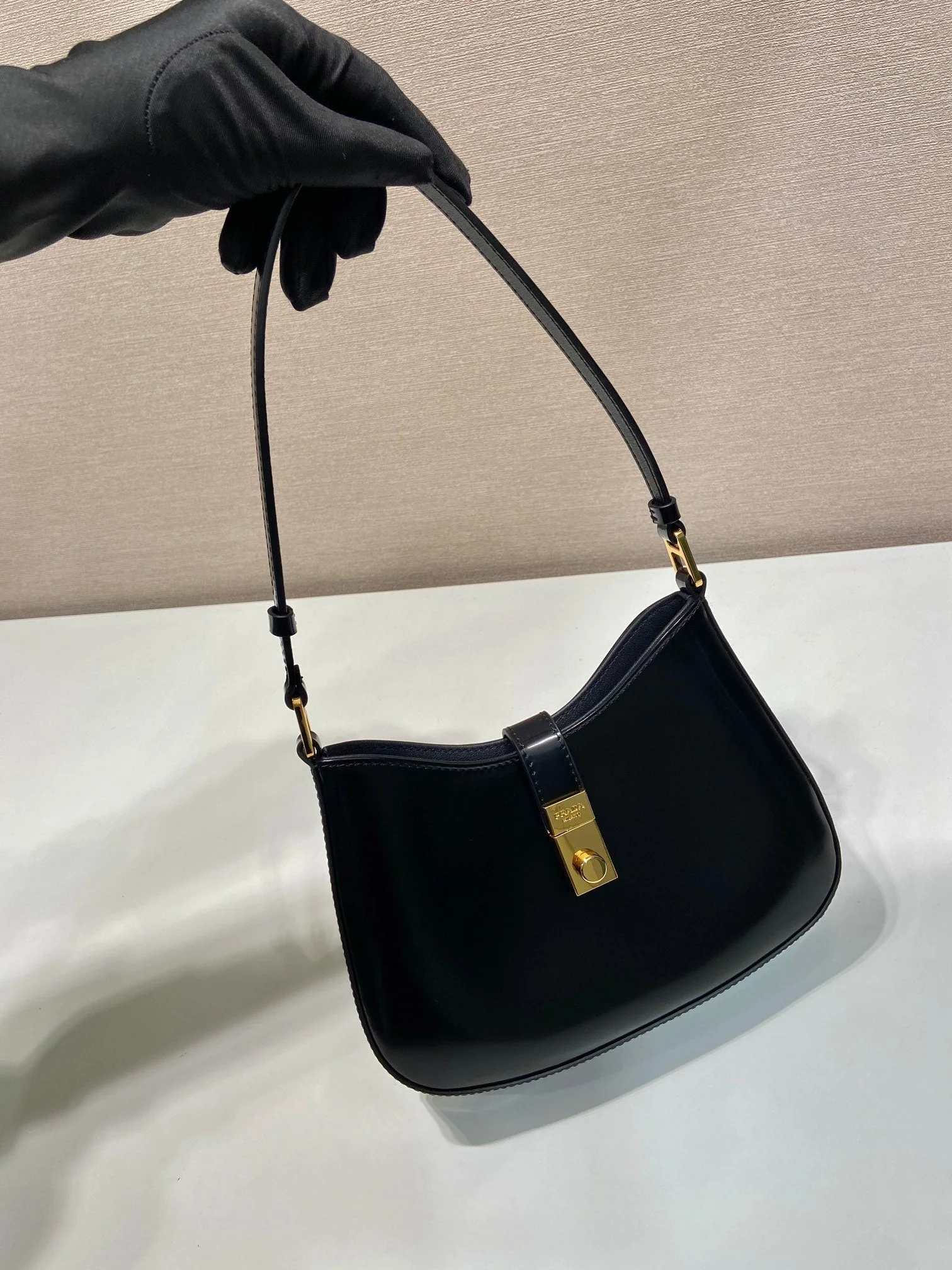 Prada CLEO SHOULDER BAG 22 IN BLACK BRUSHED LAMBSKIN WITH CLASP CLOSURE