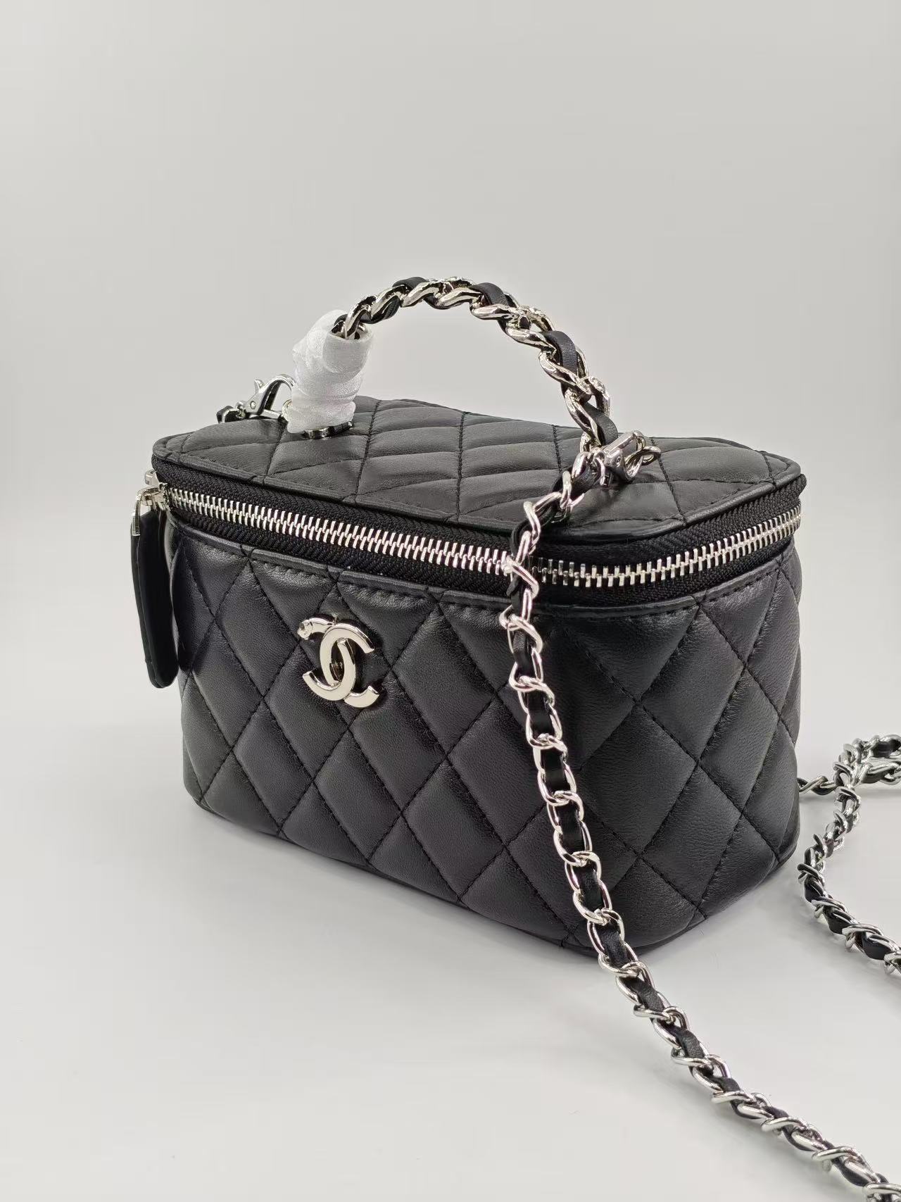 Chanel black lambskin makeup bag