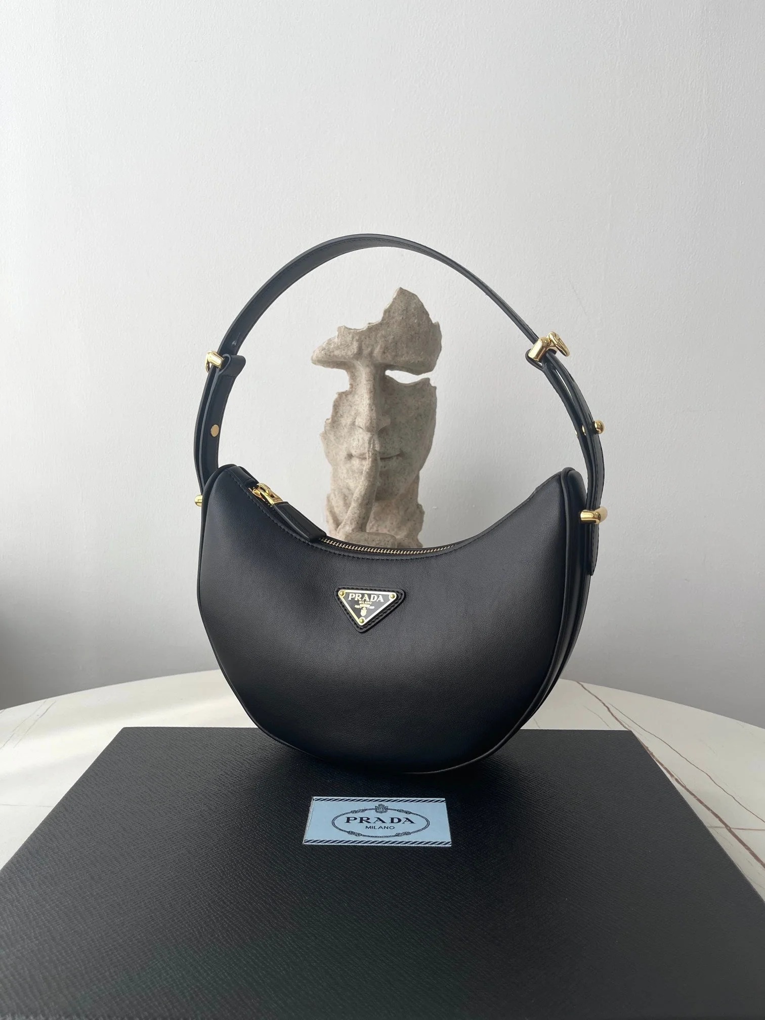Prada ARQUÉ 22 SHOULDER BAG IN BLACK LEATHER