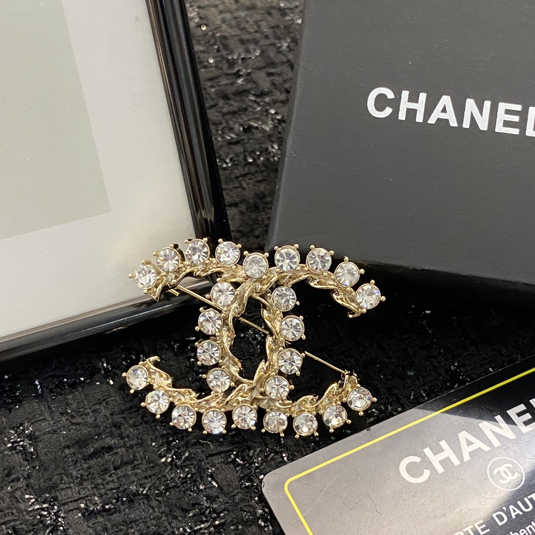 Chanel CC Brooch
