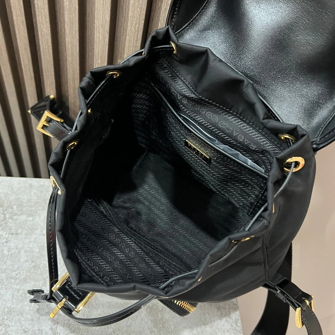 Prada BACKPACK 25 IN BLACK RE-NYLON AND GLOSSY CALFSKIN GOLD HARDWARE