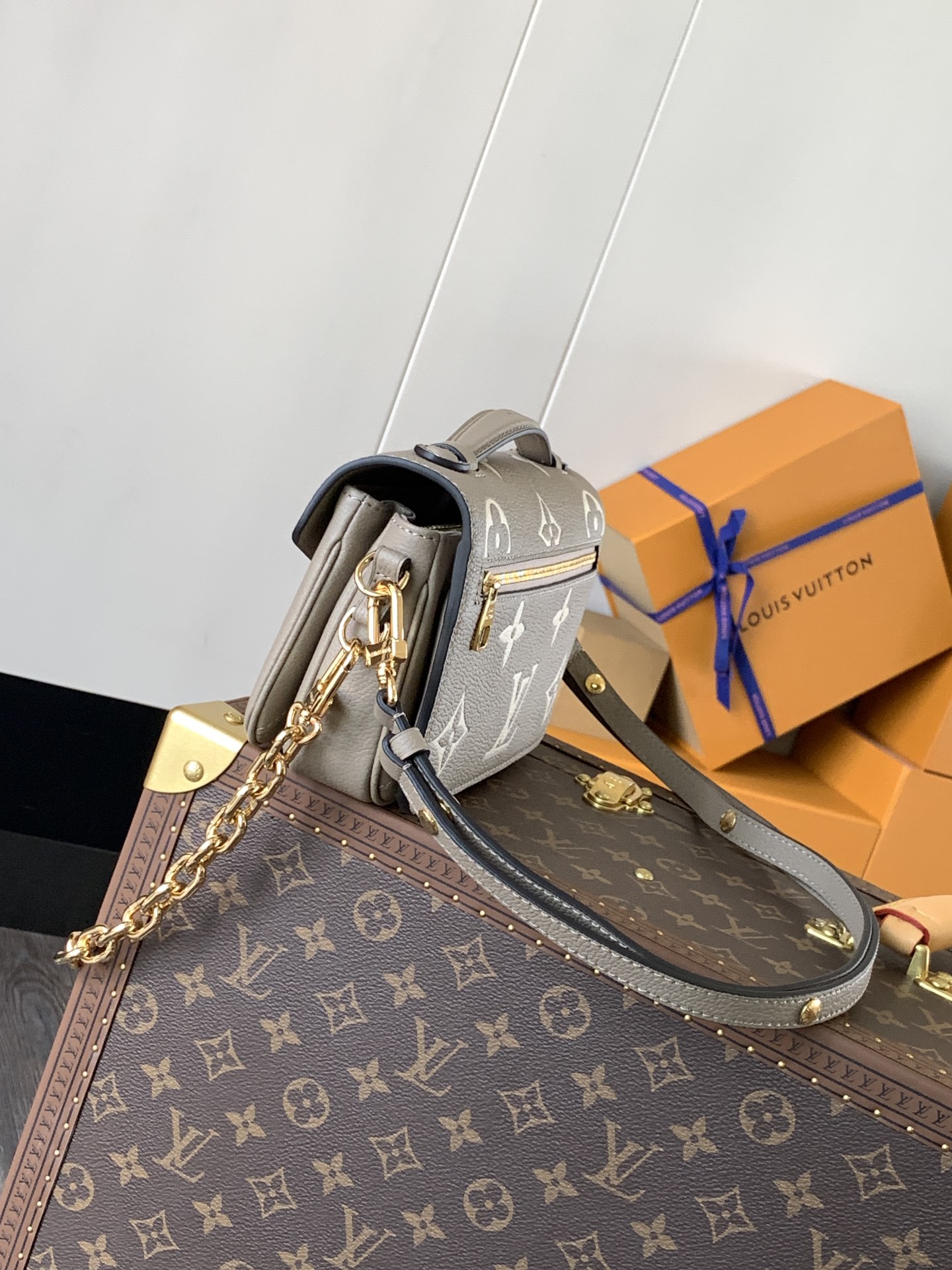 M23081 Pochette Métis East West Bag in Tourterelle Bicolor Monogram Empreinte leather